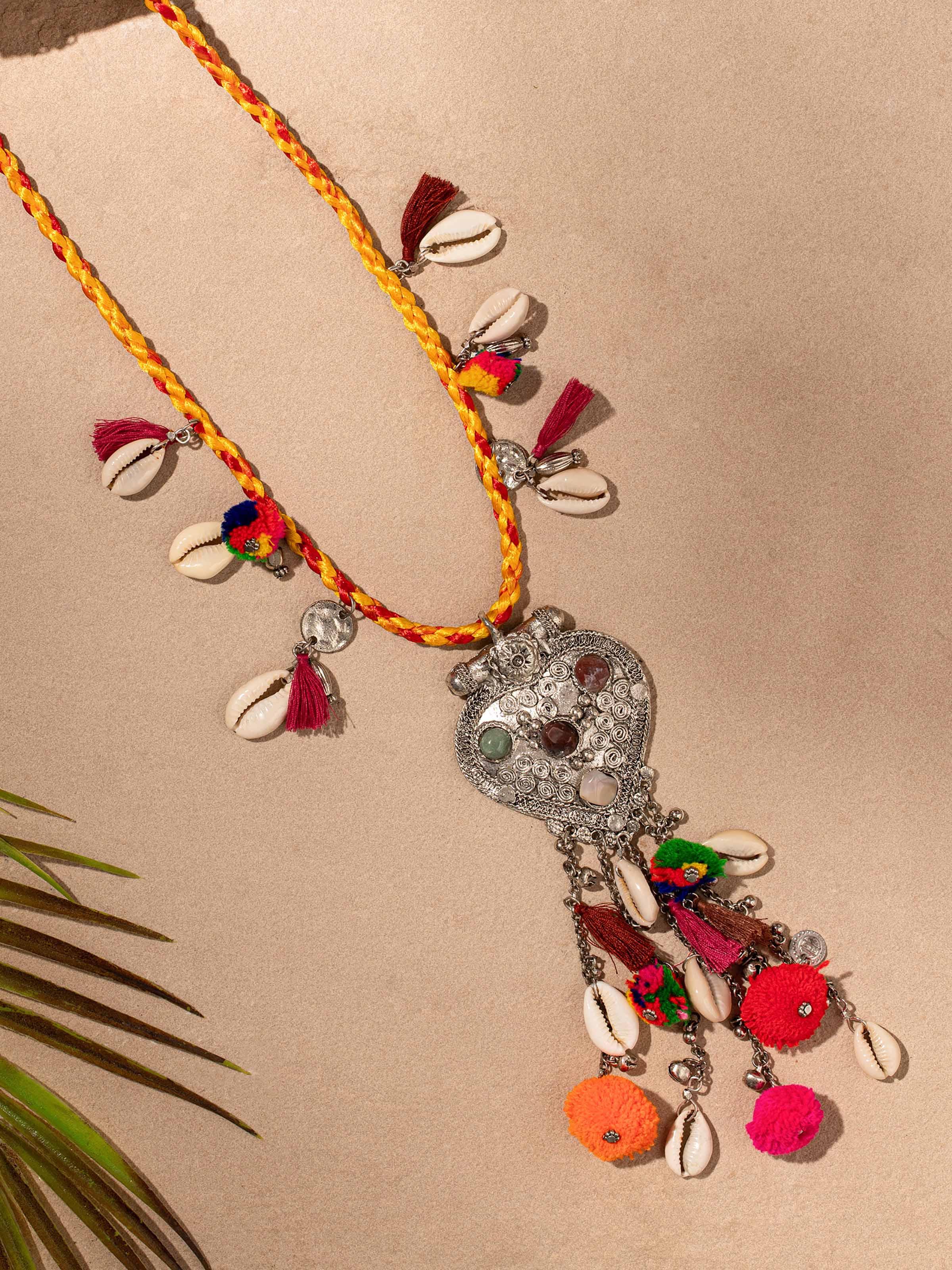 Angled view of Handcrafted Long Necklace showcasing the unique bead arrangement and design.