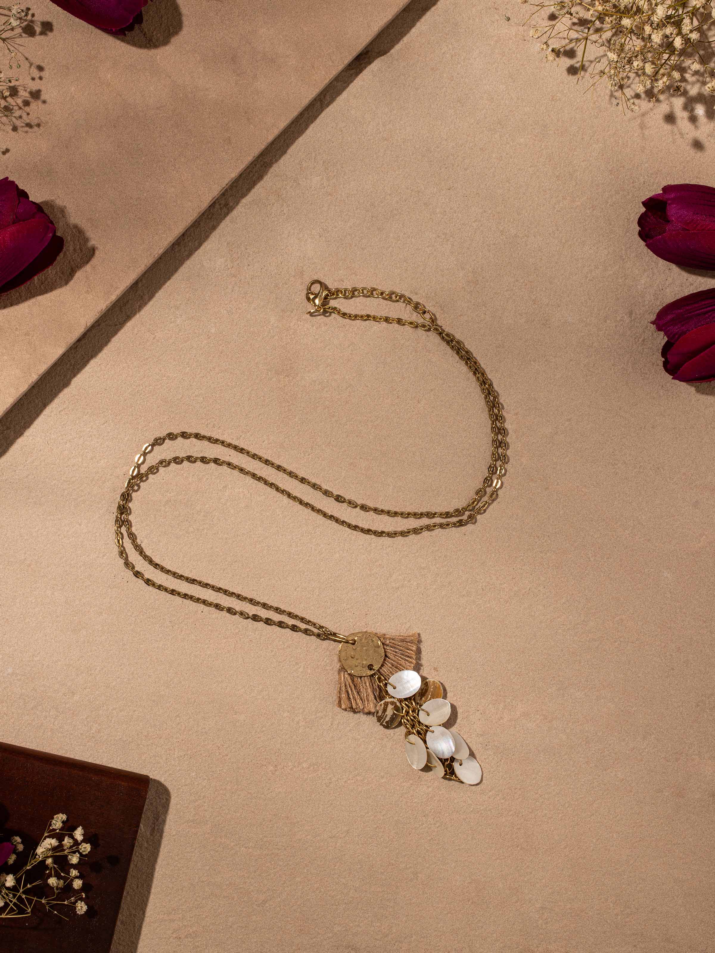 Close-up view of handcrafted long necklace focusing on the intricate details and quality craftsmanship.