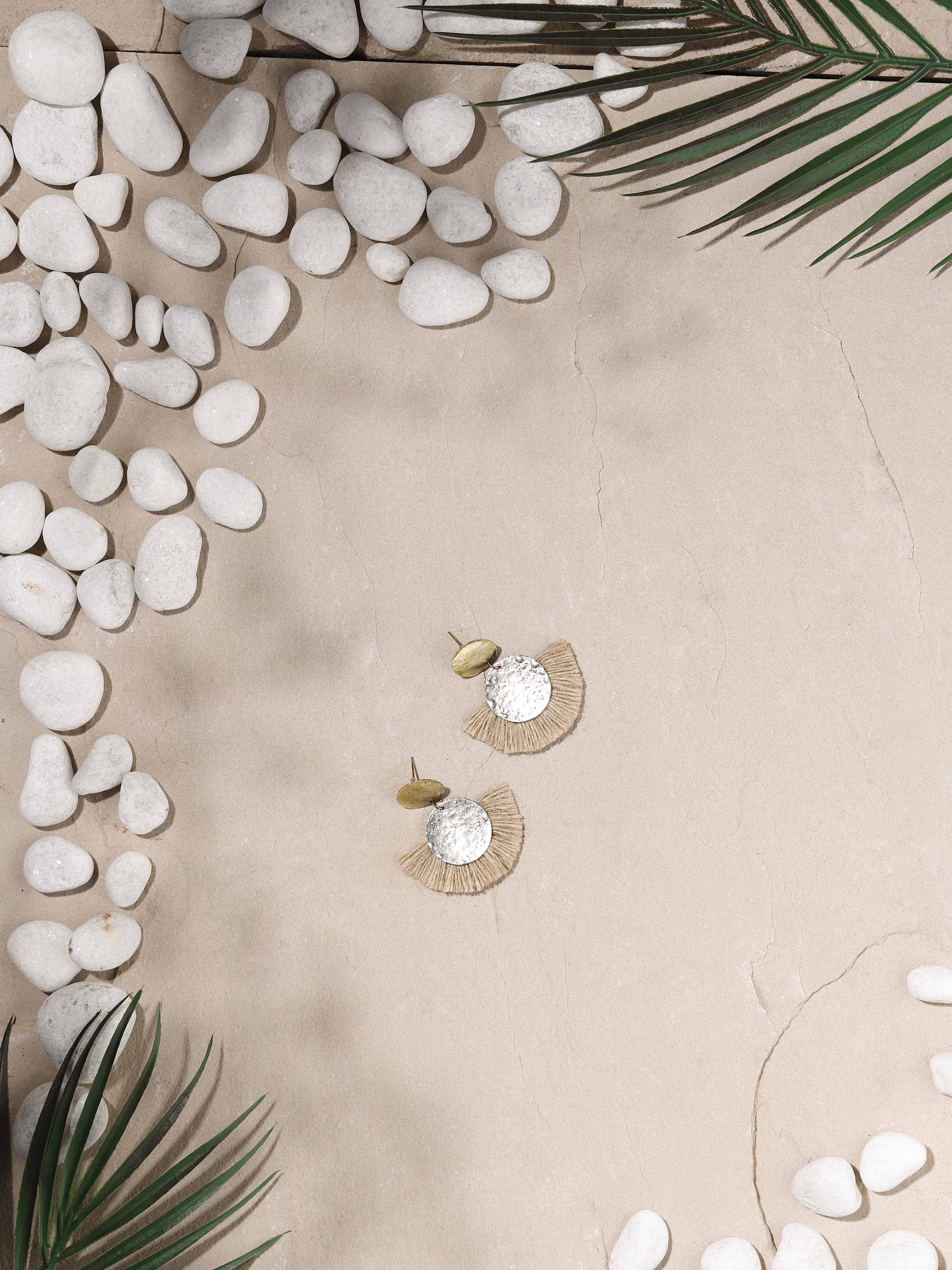 Side view of Handcrafted Drop Earrings showcasing the detailed craftsmanship and elegant drop design.