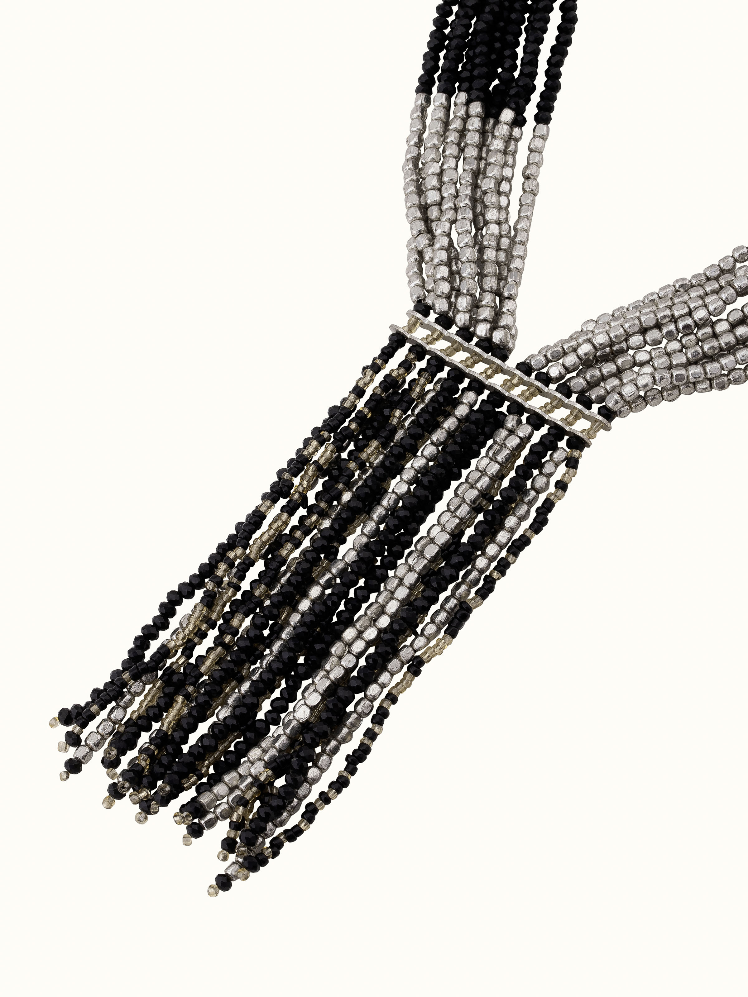 Angled view of Handcrafted long necklace showcasing its artistic design and craftsmanship