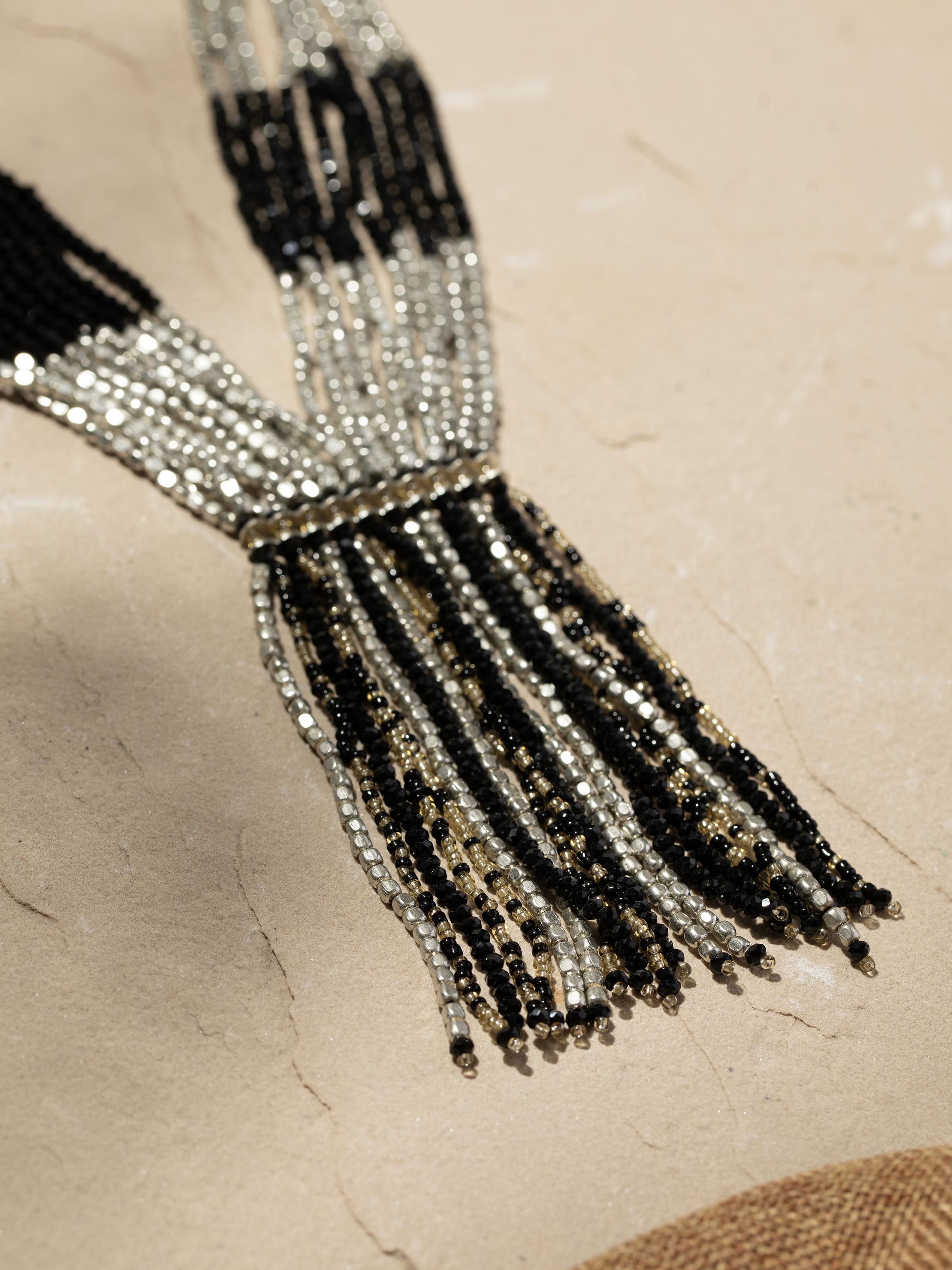 Detailed view of Handcrafted long necklace highlighting intricate patterns and artisanal quality