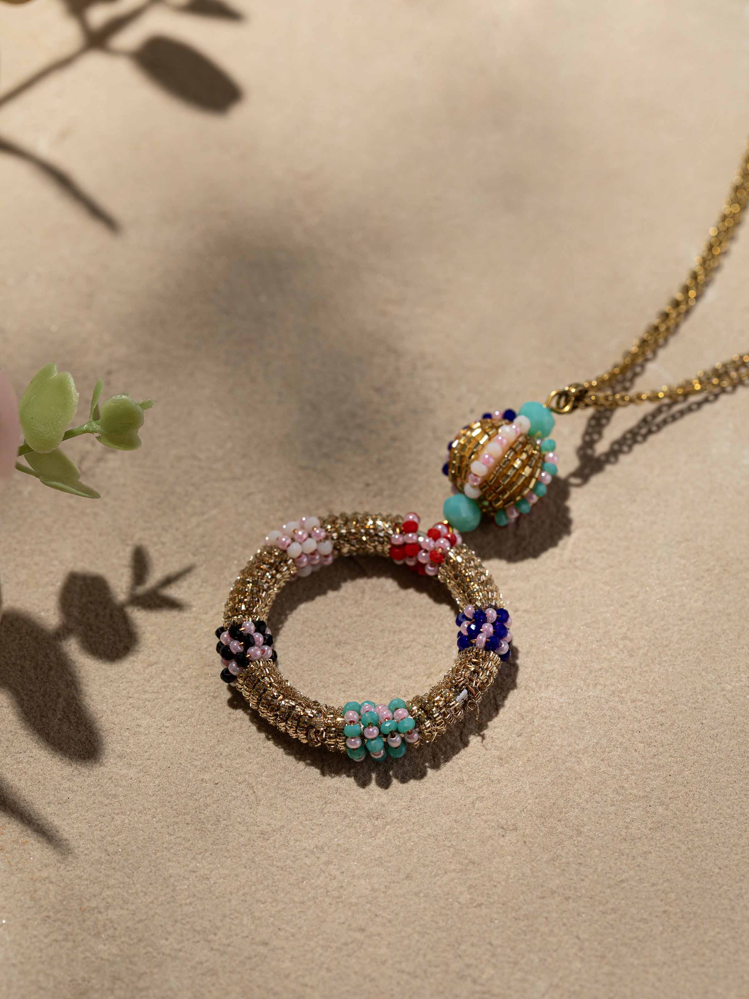 Detailed front view of handcrafted long necklace highlighting its sophisticated design and finish