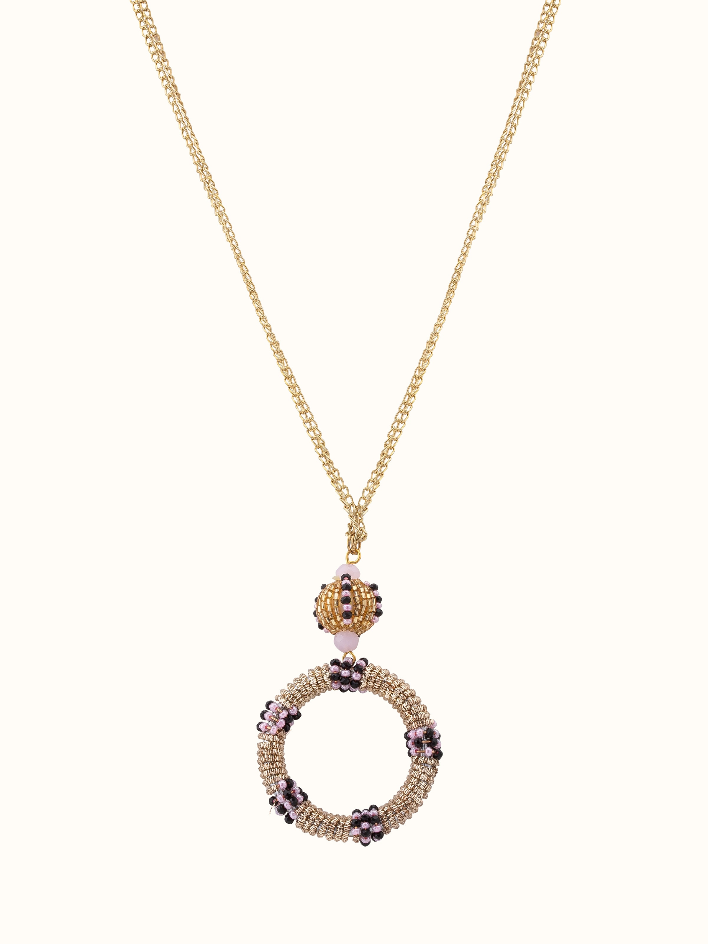 Front view of handcrafted long necklace featuring elegant design.