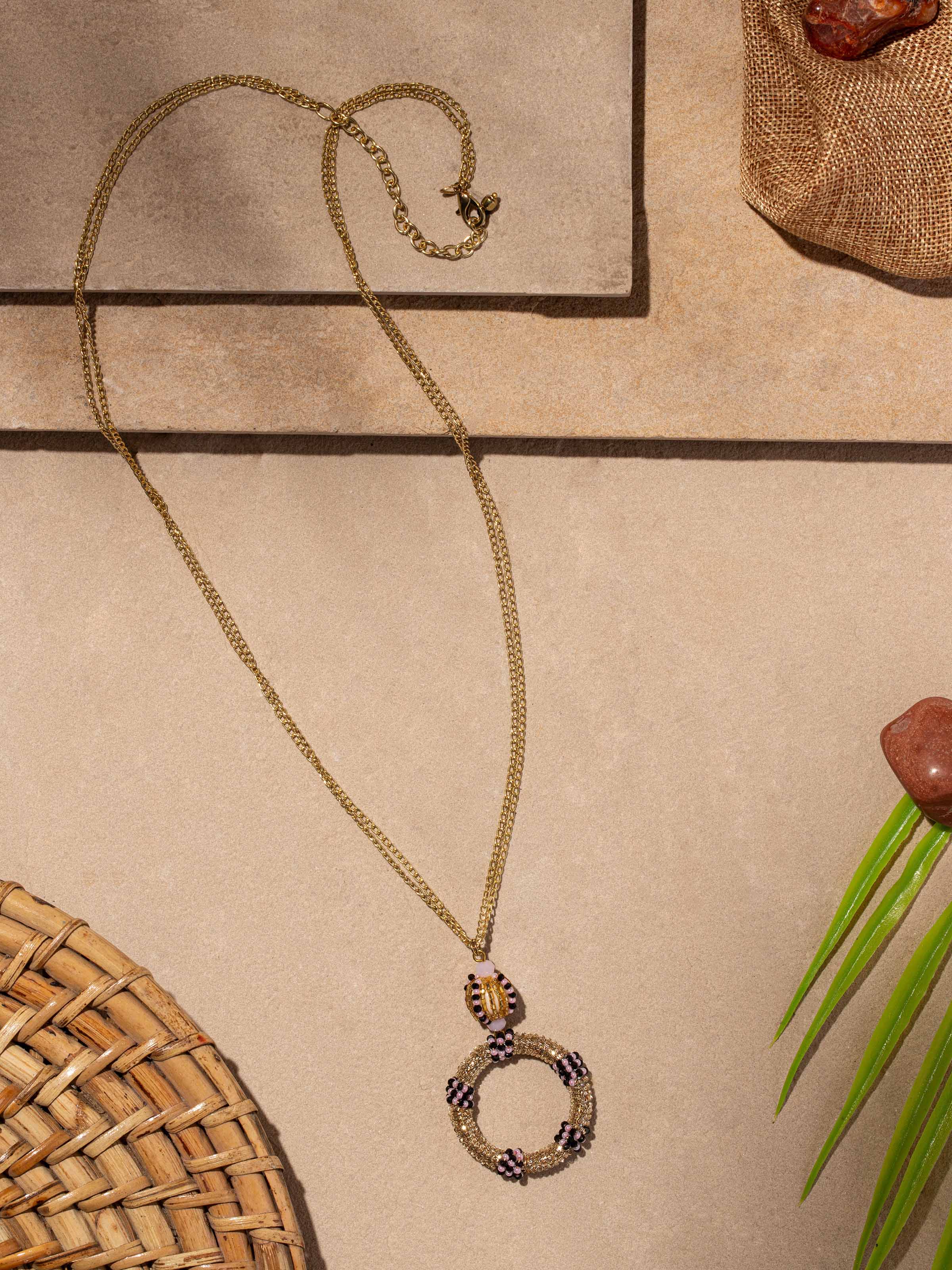 Detailed view of handcrafted long necklace with fine craftsmanship.