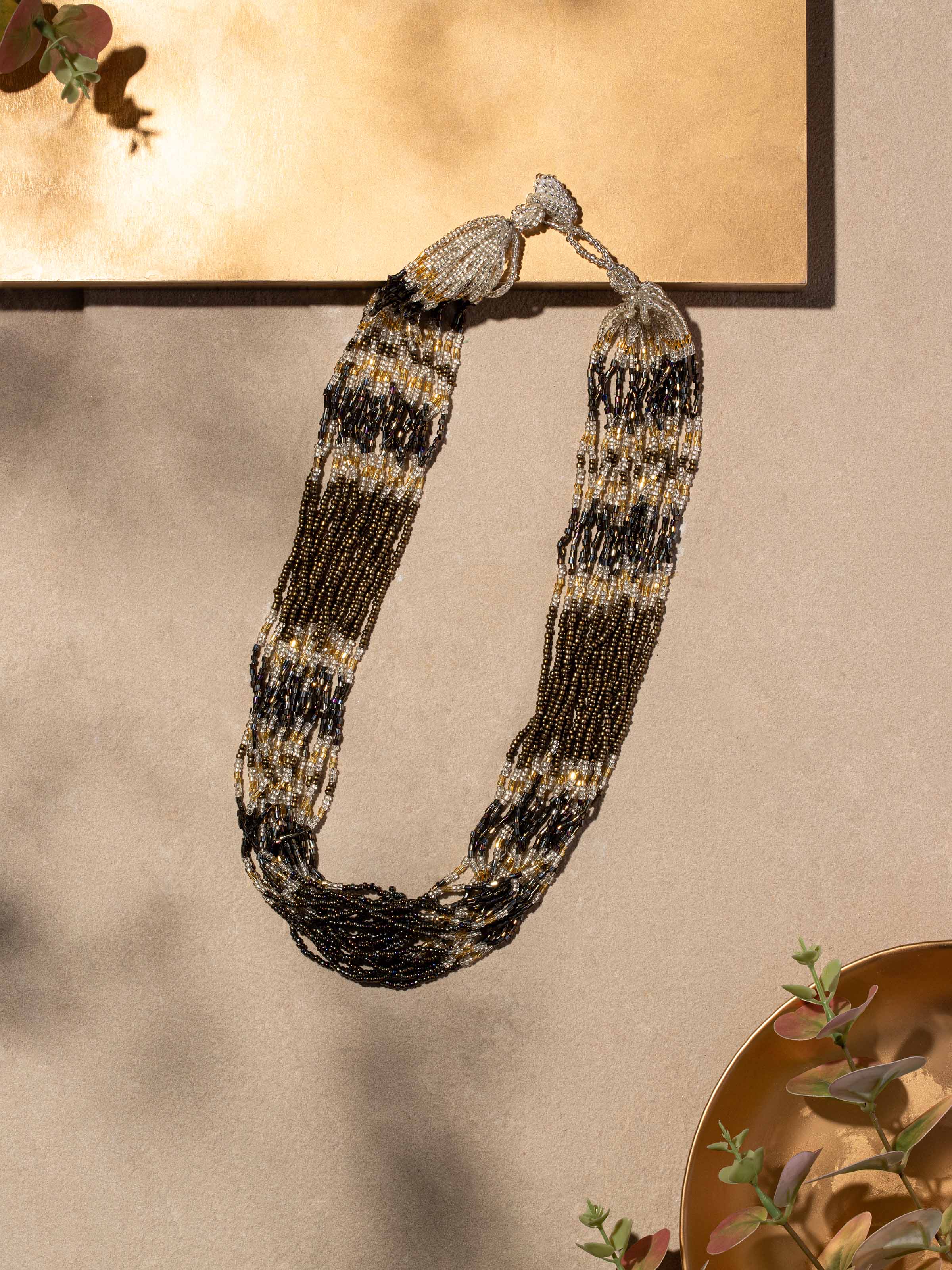 Side view of Handcrafted Long Necklace highlighting the elegant design and details.