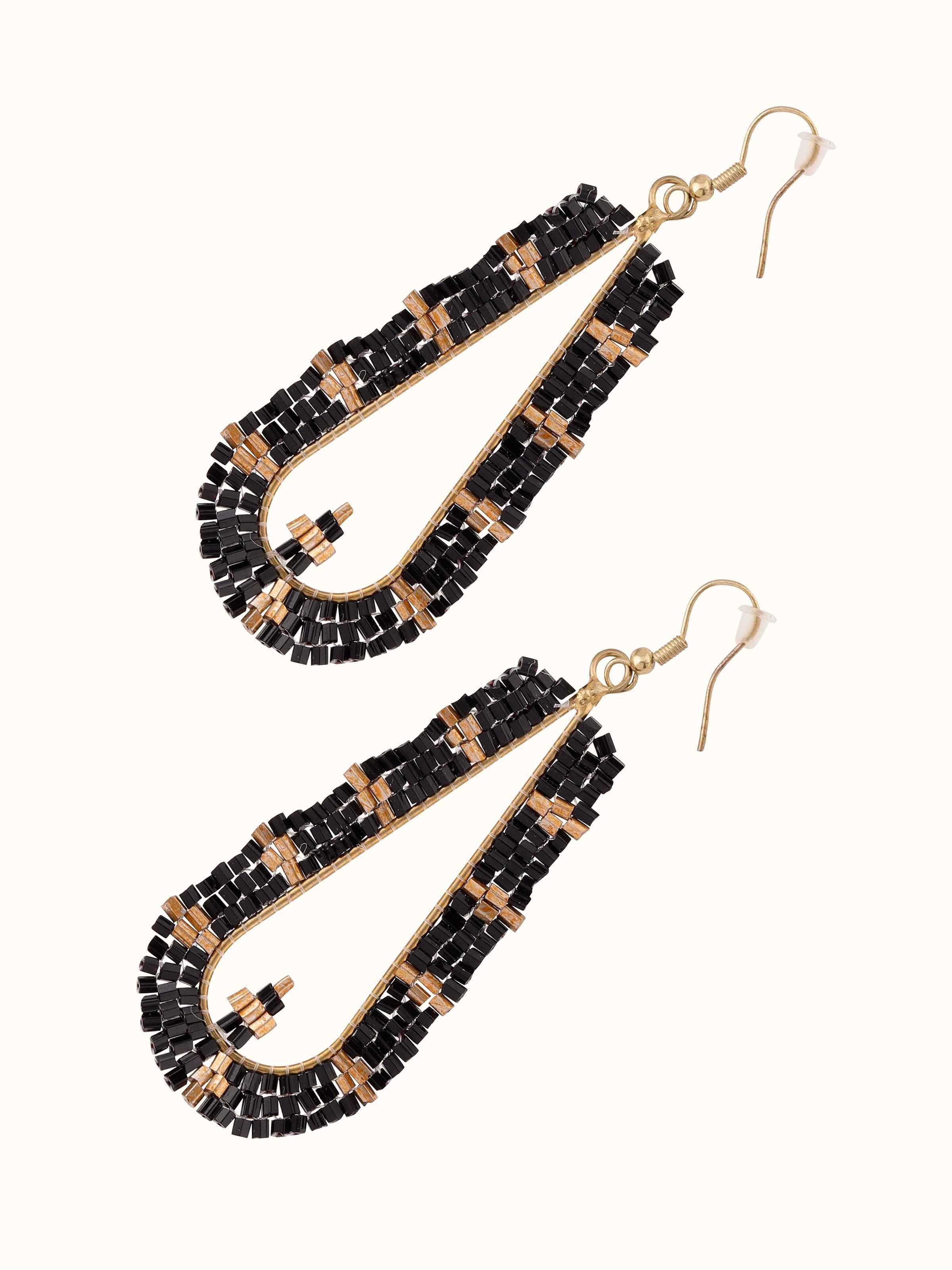 Detailed view of Handcrafted Drop Earrings focusing on artisanal craftsmanship and unique design.