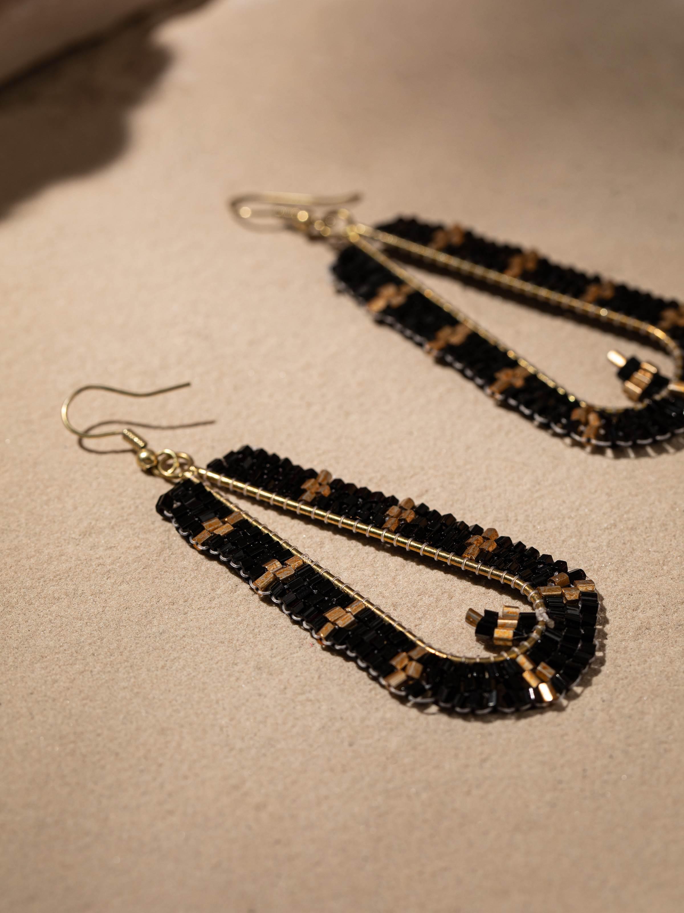 Back view of Handcrafted Drop Earrings showcasing the secure fastening and overall design.