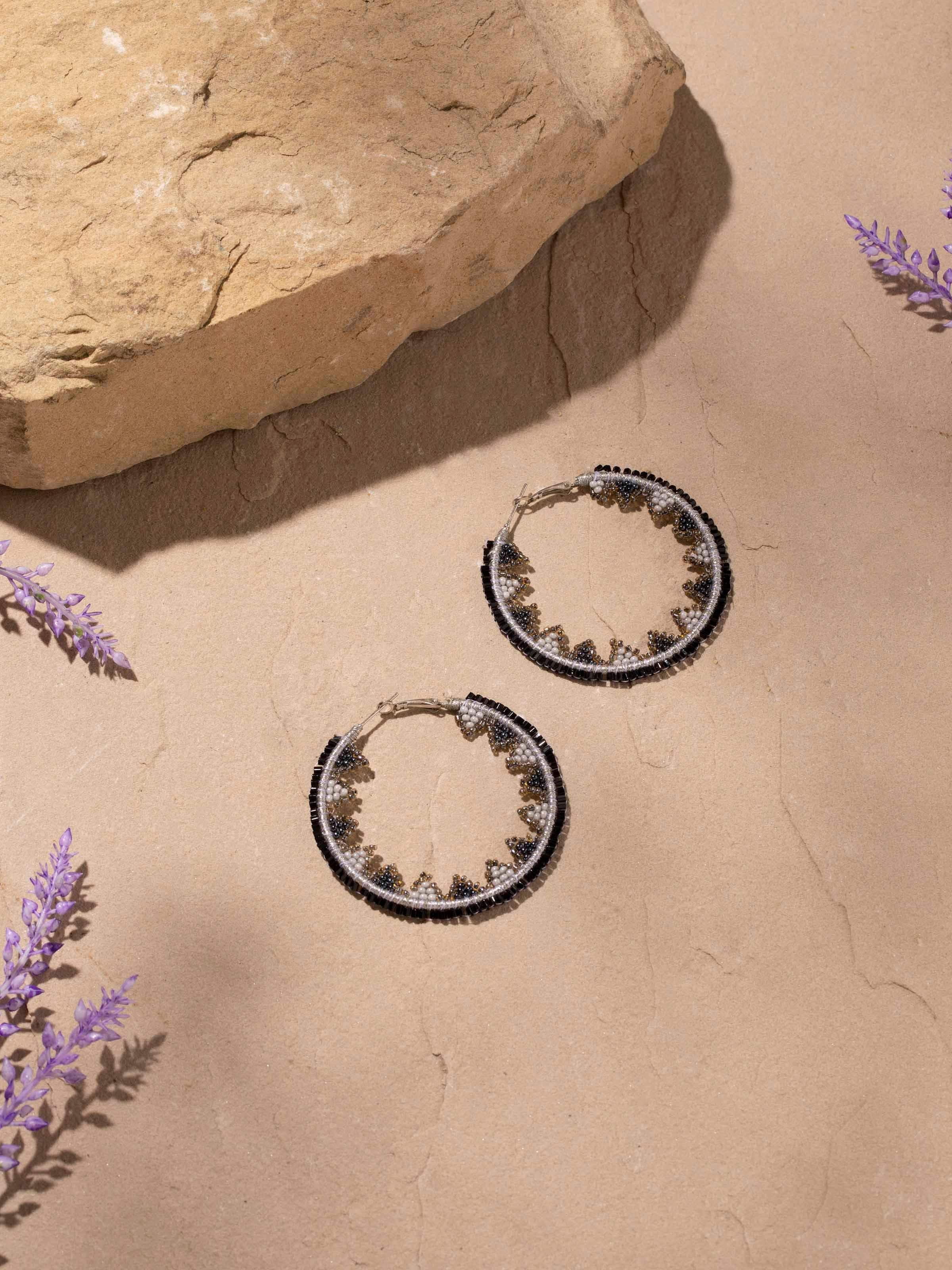 Close-up view of Handcrafted Hoop Earrings highlighting detailed design and finish.