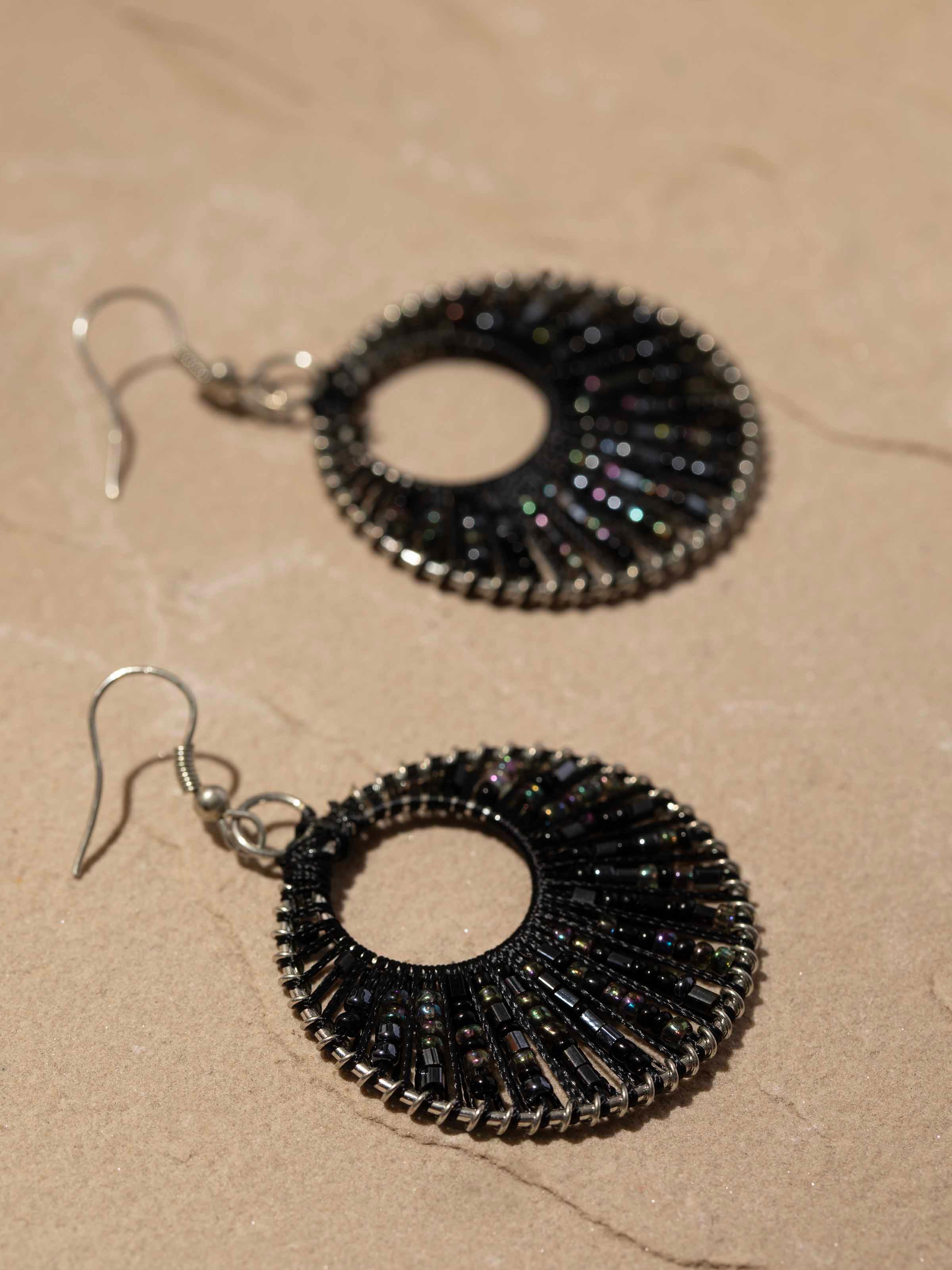 Detailed image of Handcrafted Drop Earrings emphasizing the fine artisanal work and unique design.