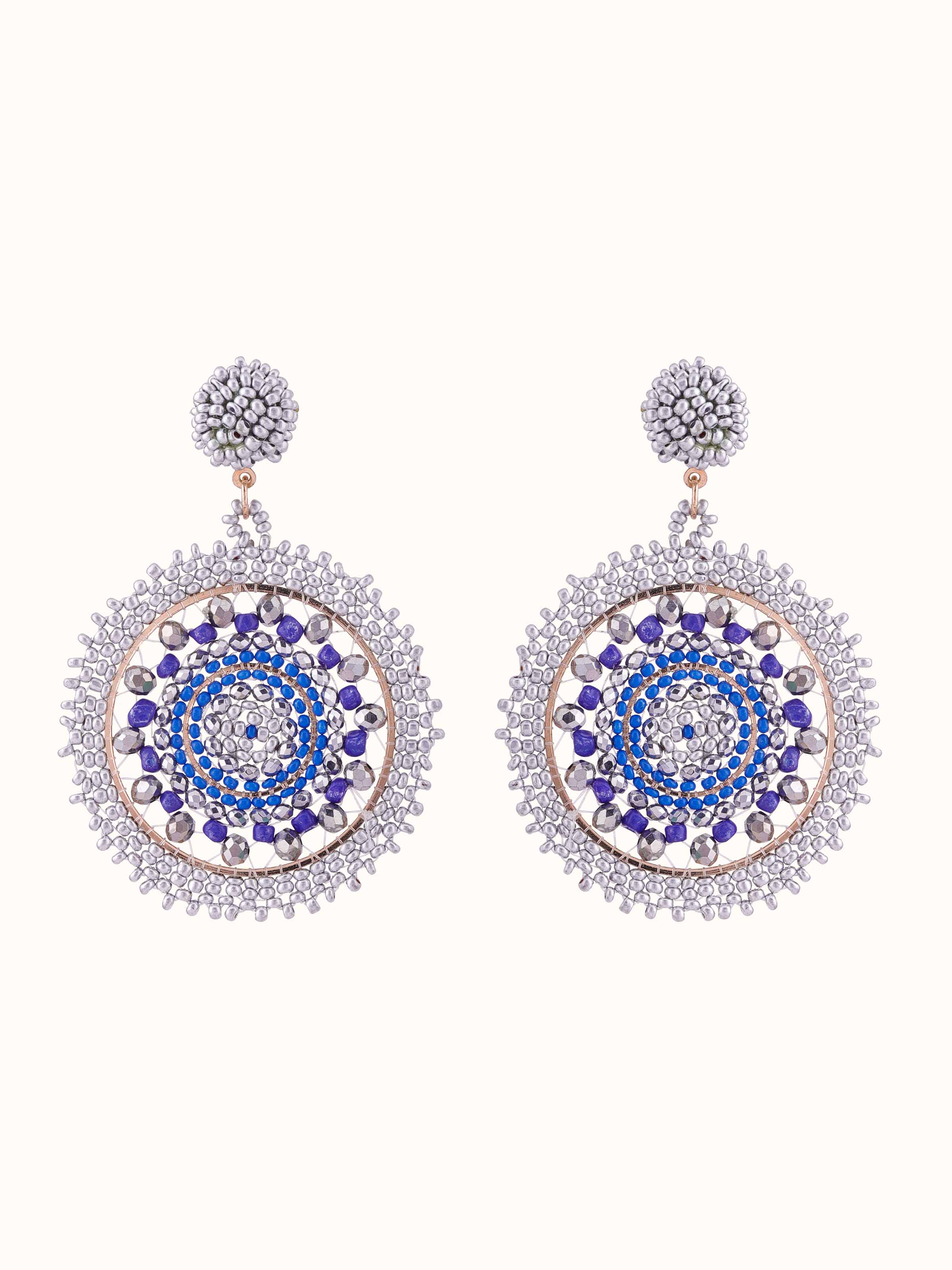 Front view of handcrafted drop earrings highlighting intricate design and craftsmanship