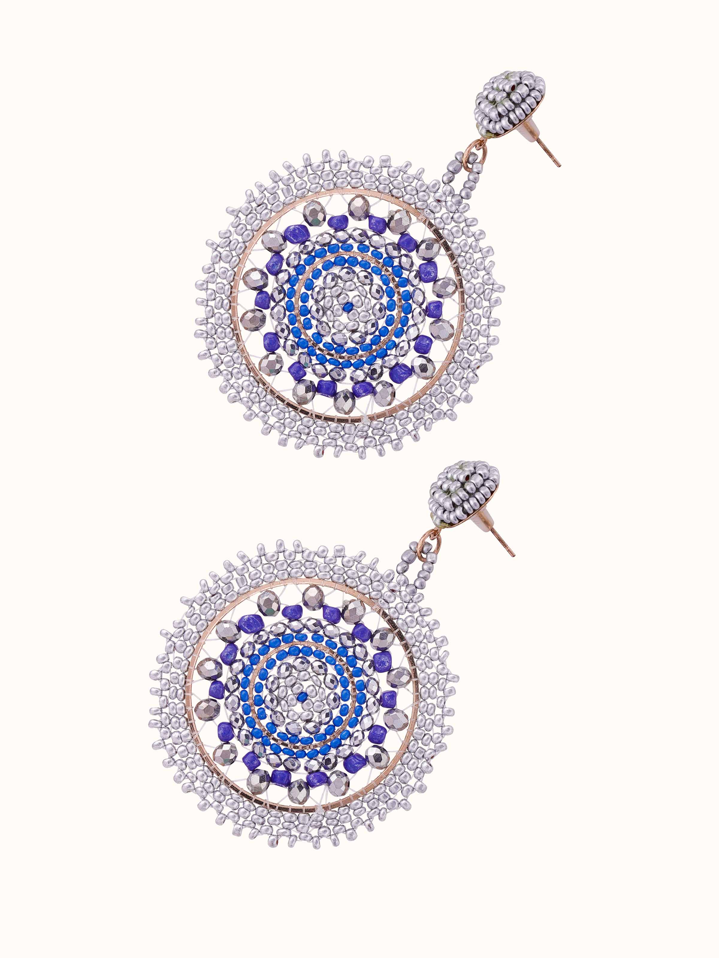 Angled view of handcrafted drop earrings displaying their elegant drop and design