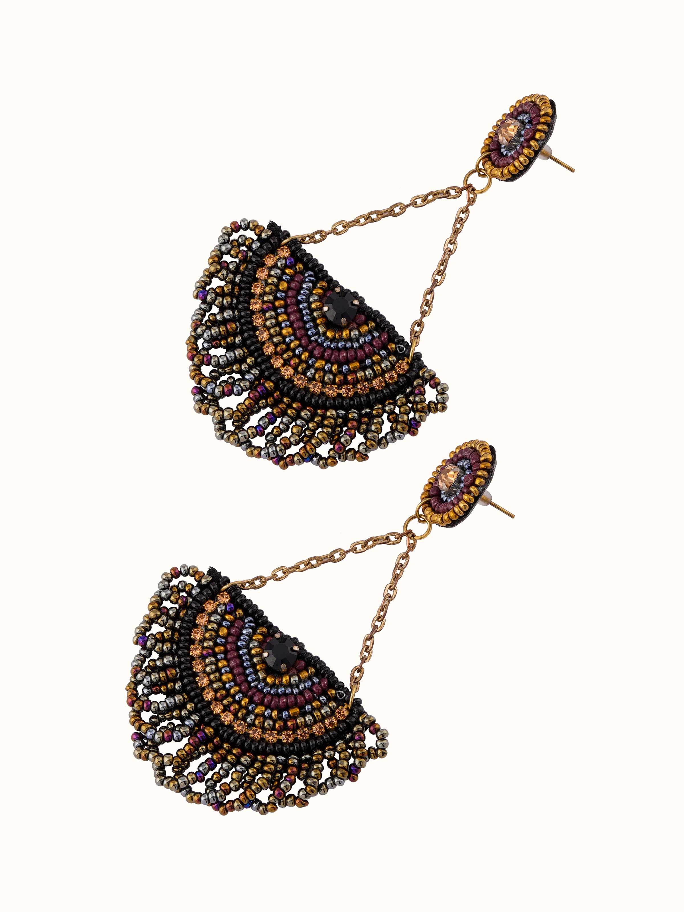 Detailed view of handcrafted drop earrings emphasizing unique design features