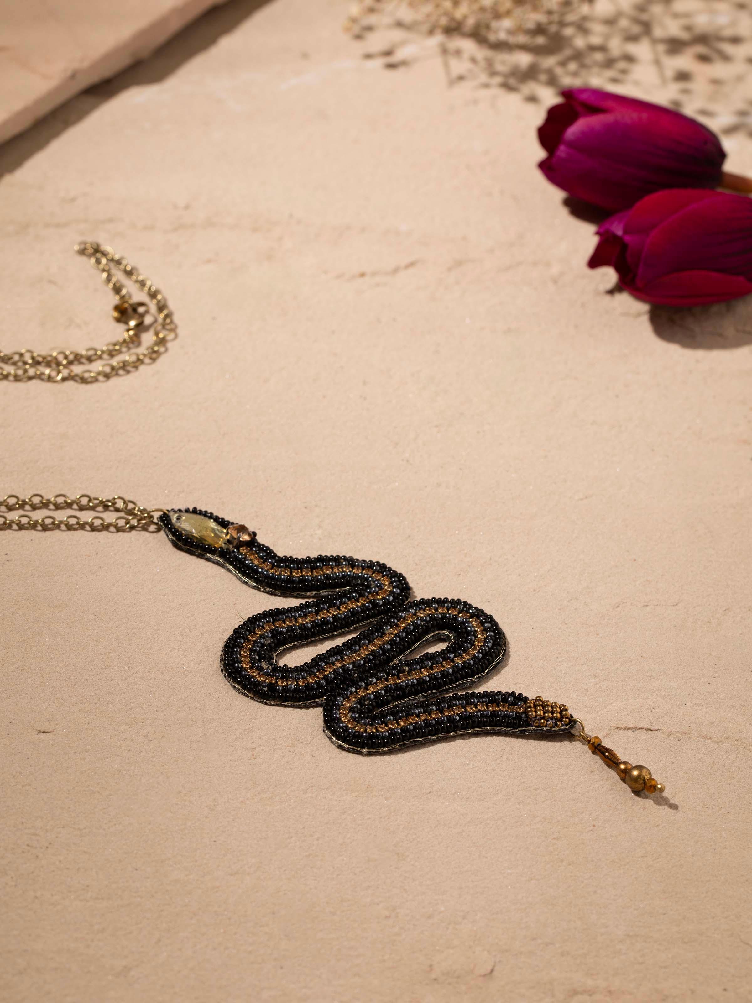 Side view of Handcrafted Long Necklace displaying the sophisticated length and style.