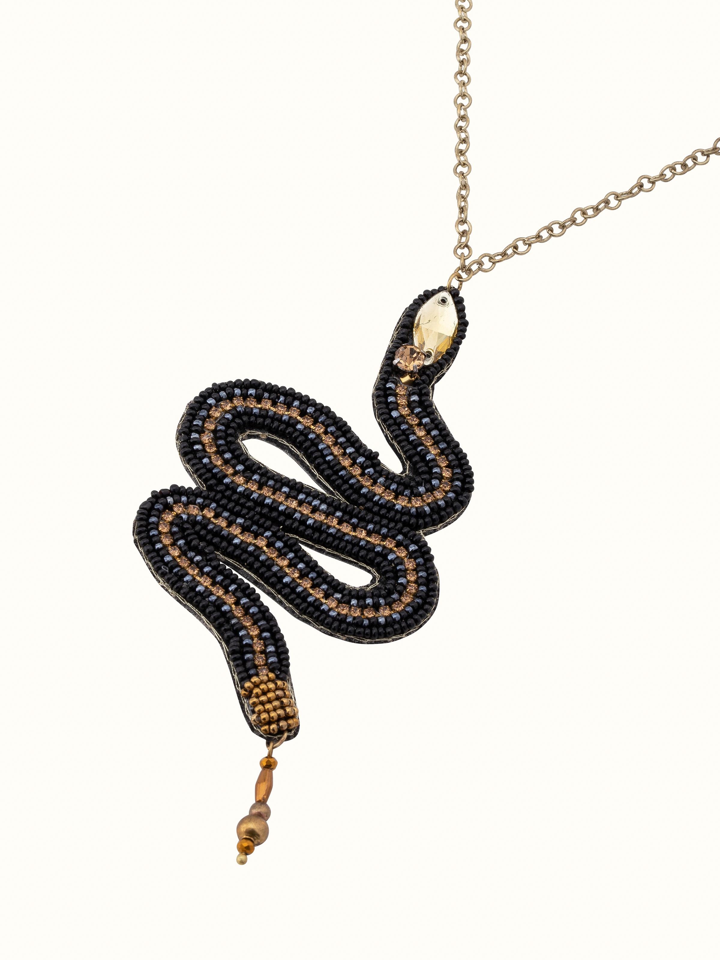 Angled view of Handcrafted Long Necklace emphasizing the intricate details and craftsmanship.