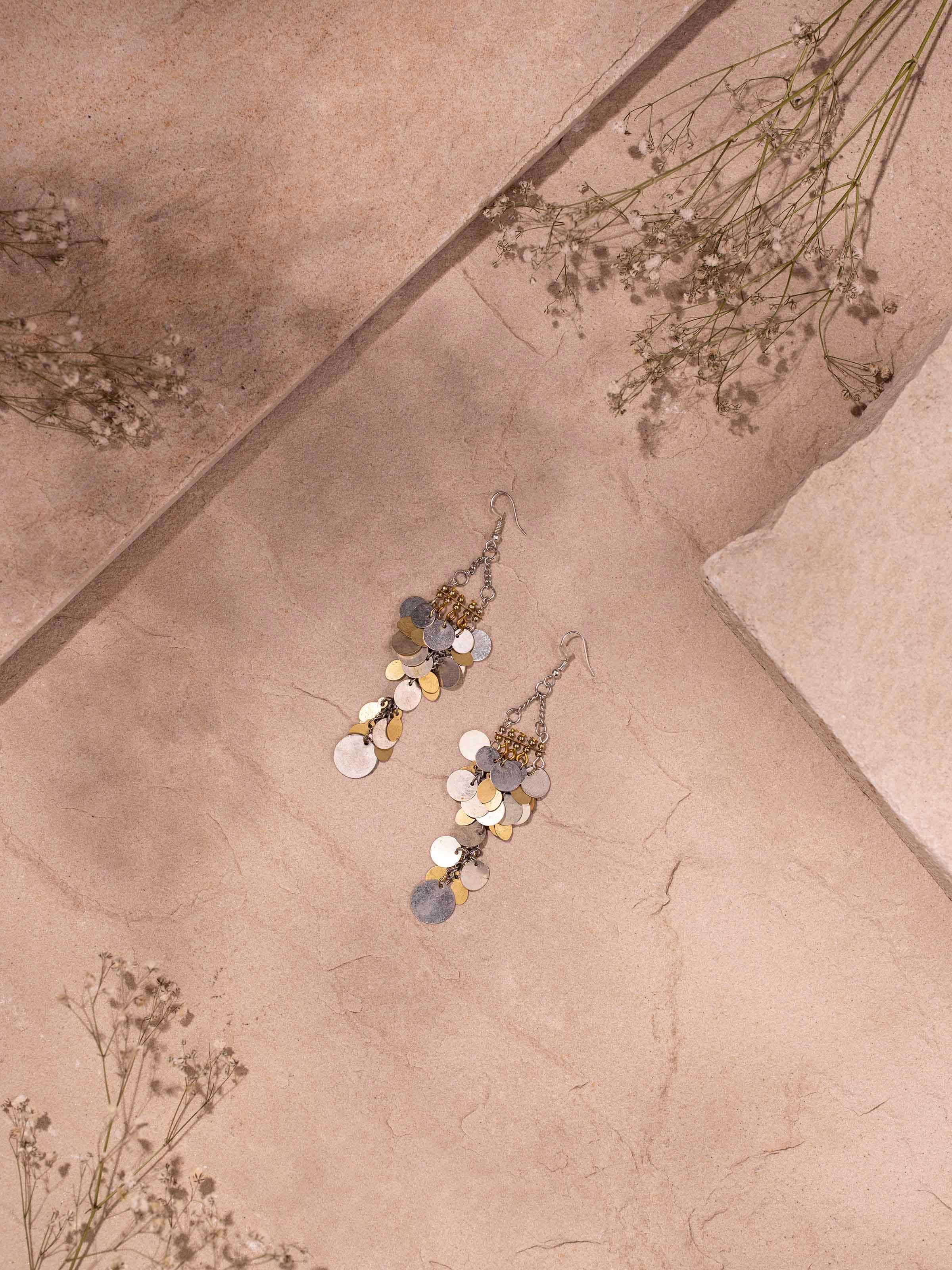 Close-up view of handcrafted drop earrings highlighting the fine craftsmanship.