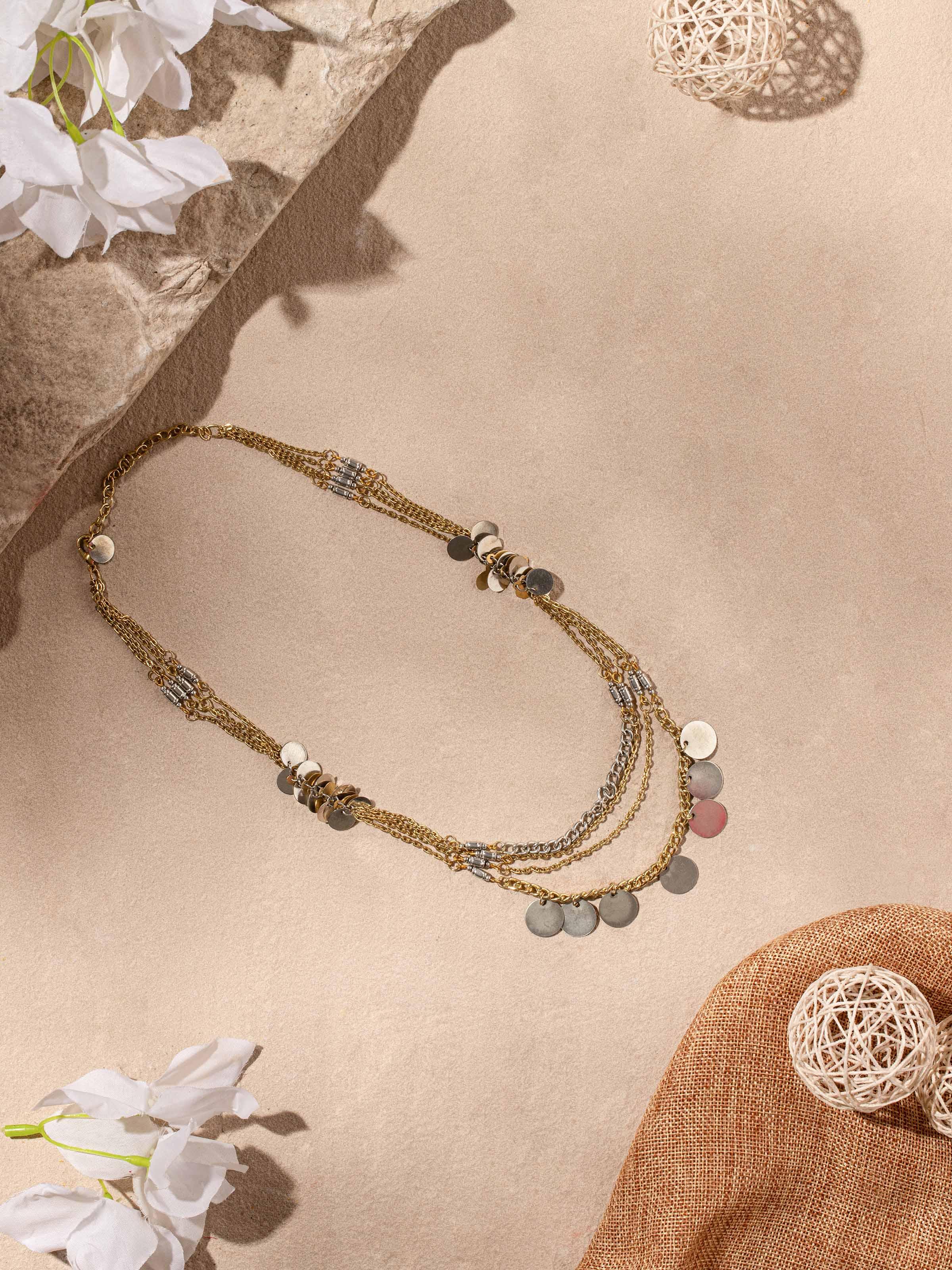 Angled view of Handcrafted Long Necklace highlighting the unique and intricate patterns.