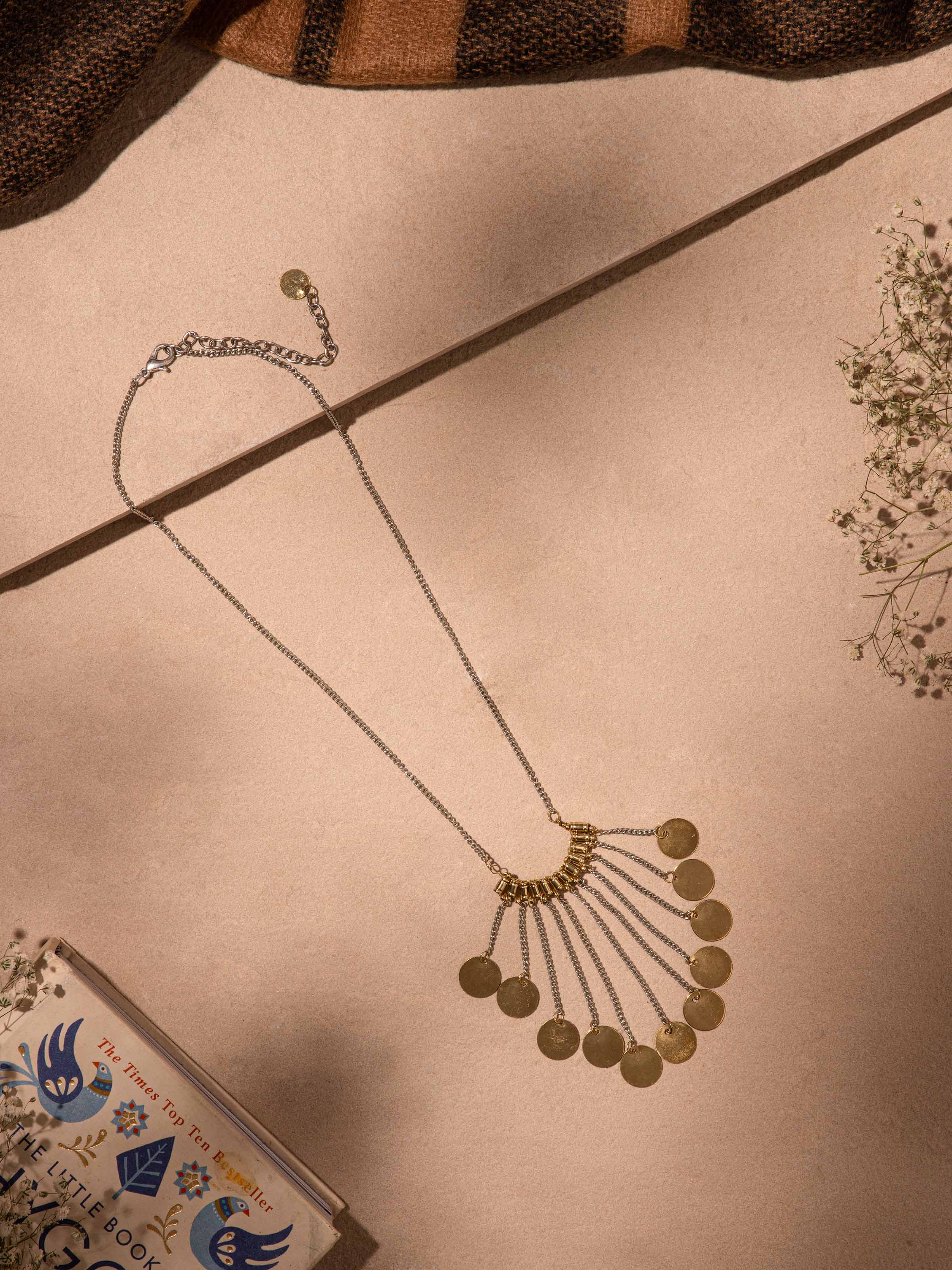 Close-up view of handcrafted long necklace highlighting its detailed beadwork