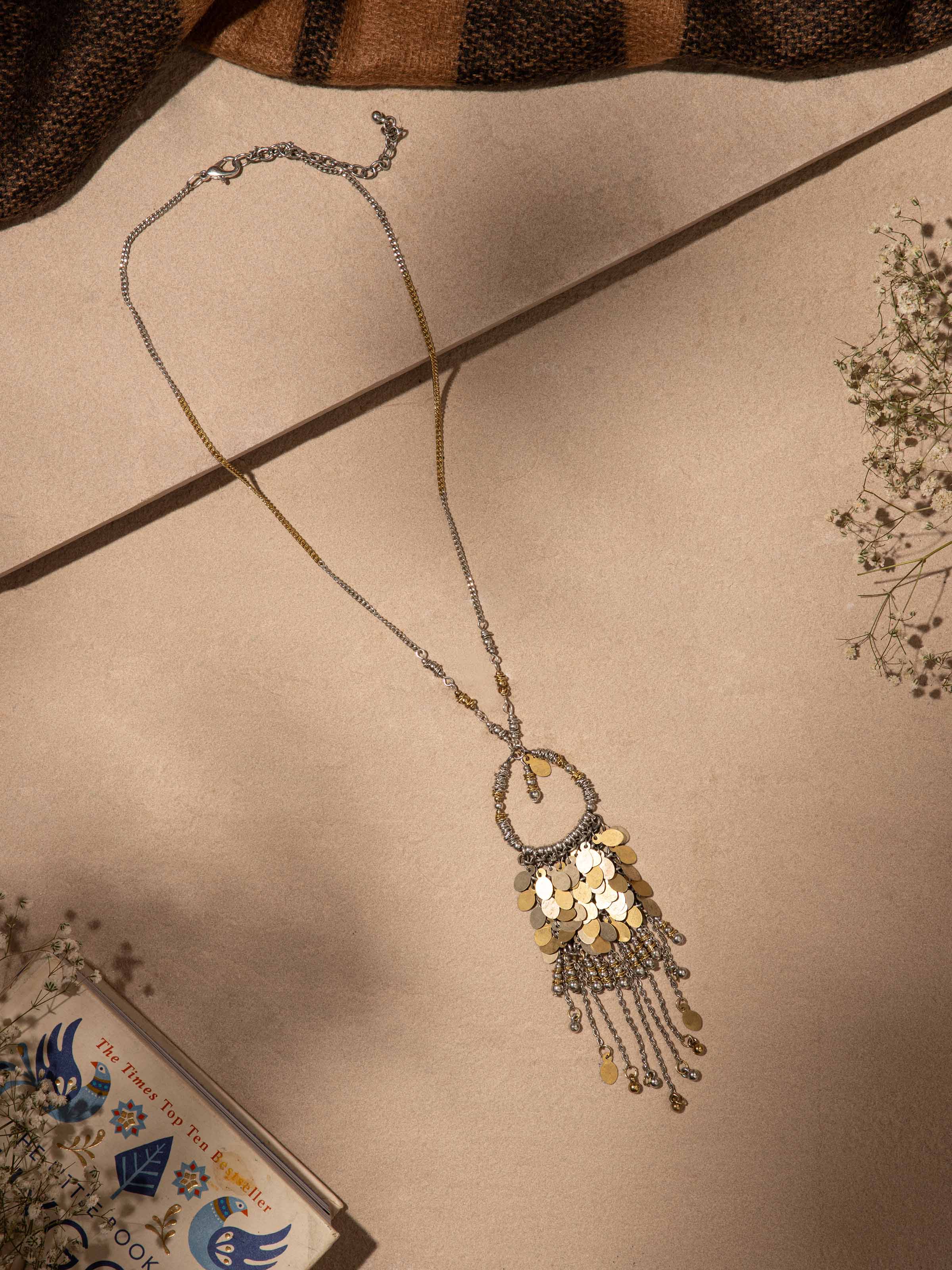 Close-up view of Handcrafted long necklace emphasizing detailed design and high-quality materials