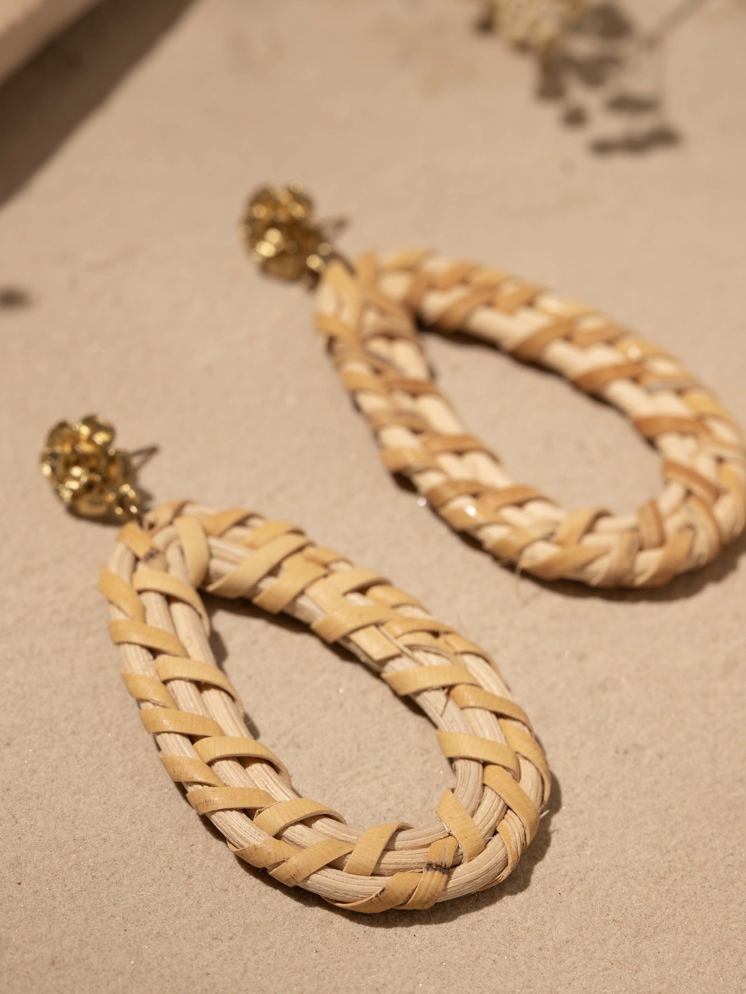 Detailed view of handcrafted stud earrings showcasing elegant design and meticulous craftsmanship