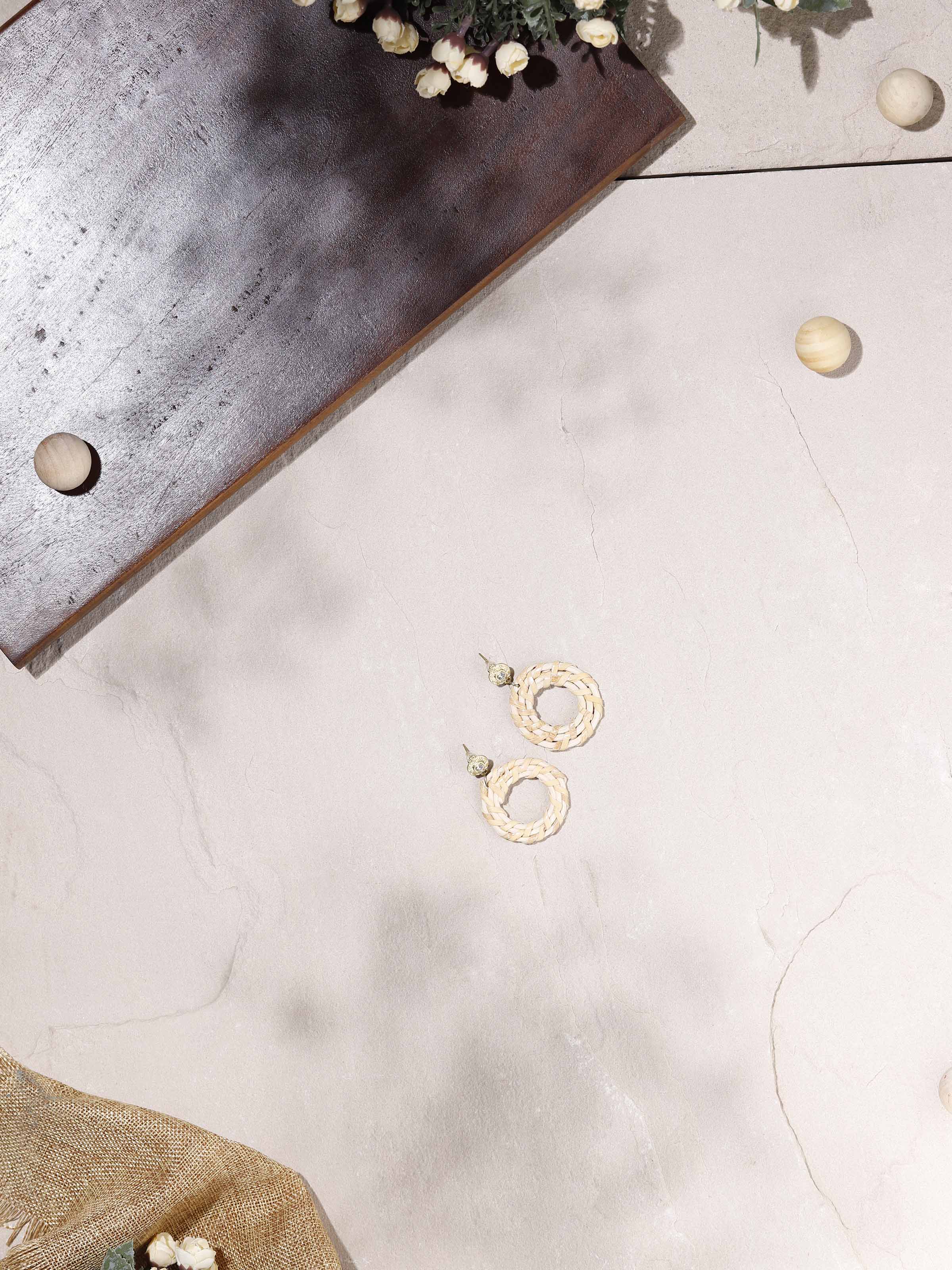 Close-up of Handcrafted stud earrings emphasizing design details