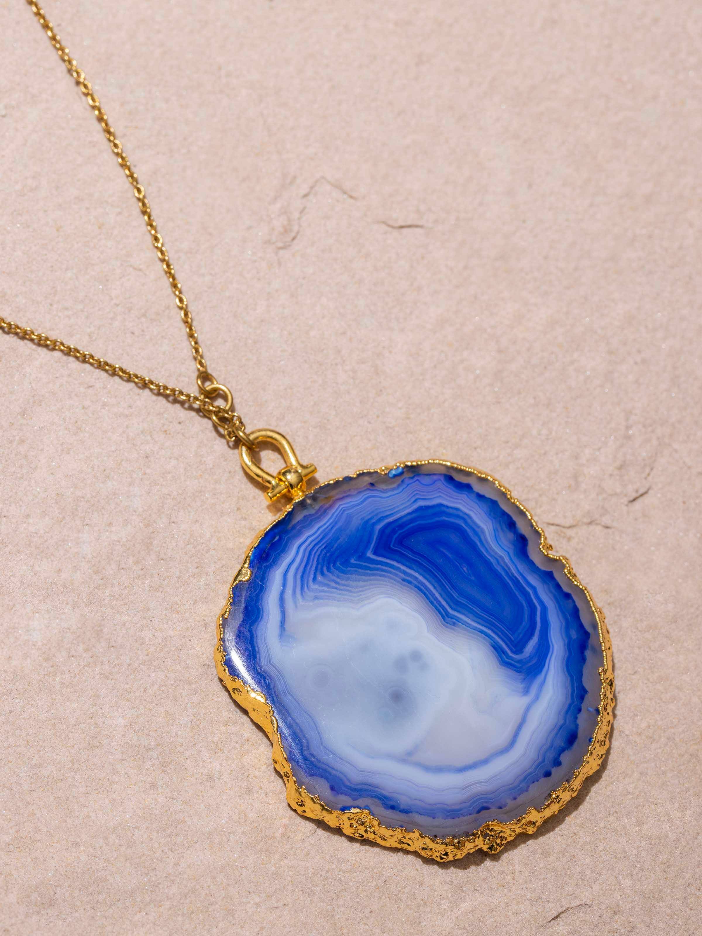 Angled view of Agate Pendant with Chain showcasing the unique pendant and chain design.