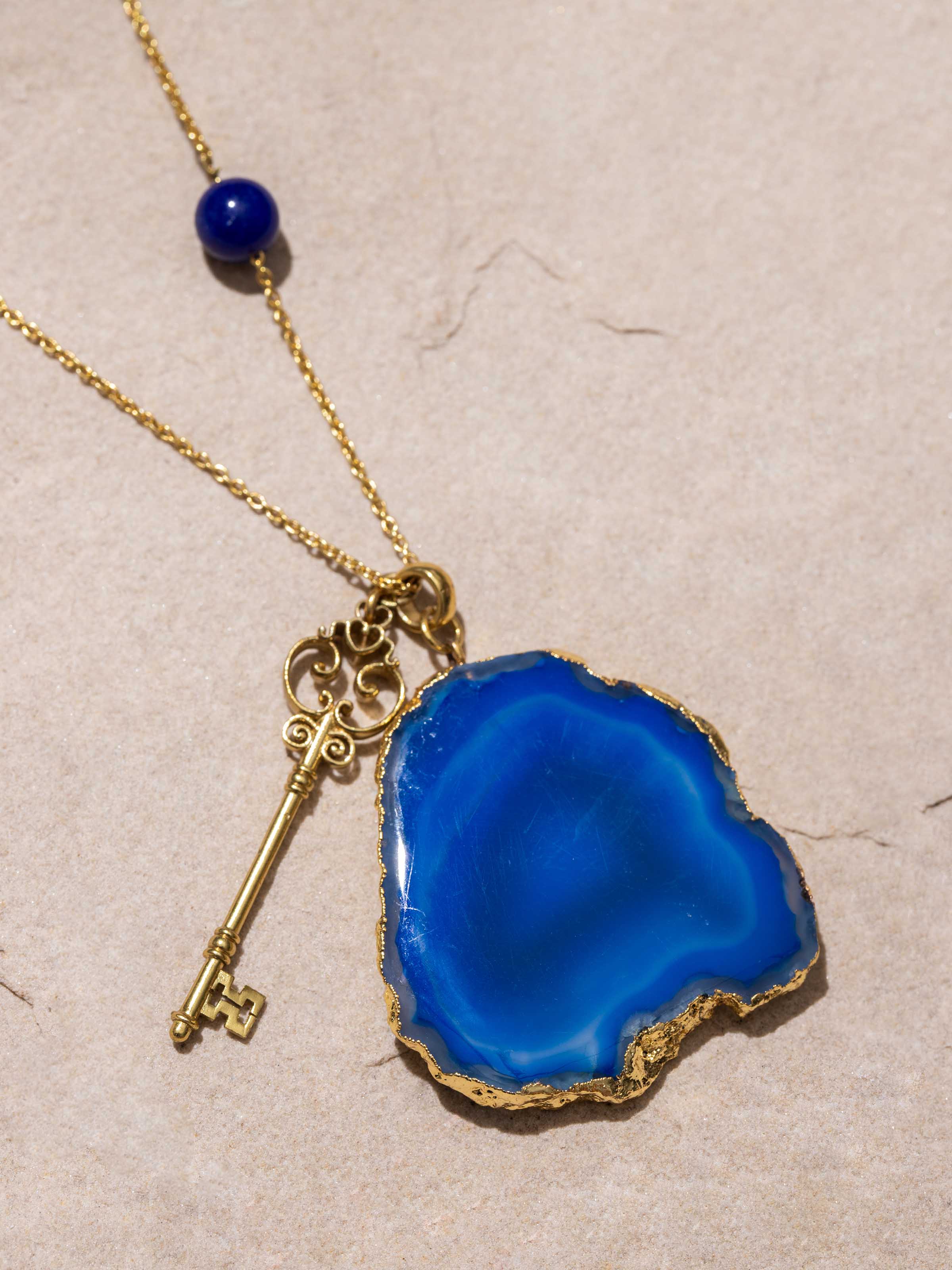 Detailed image of Agate Pendant with Chain focusing on the agate stone's natural variations and chain craftsmanship.