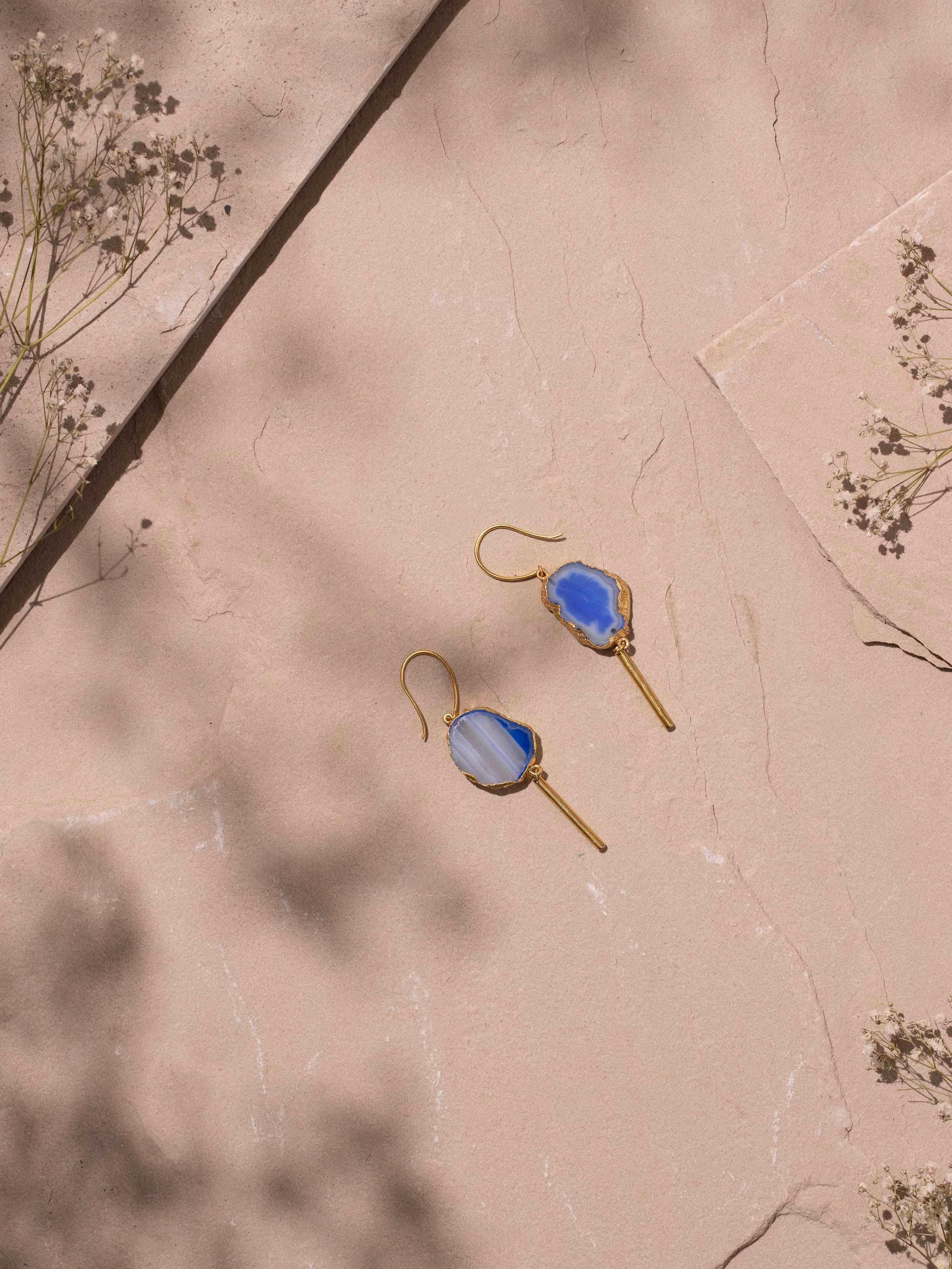 Angled view of Agate Drop Earrings showcasing the unique agate stone settings.