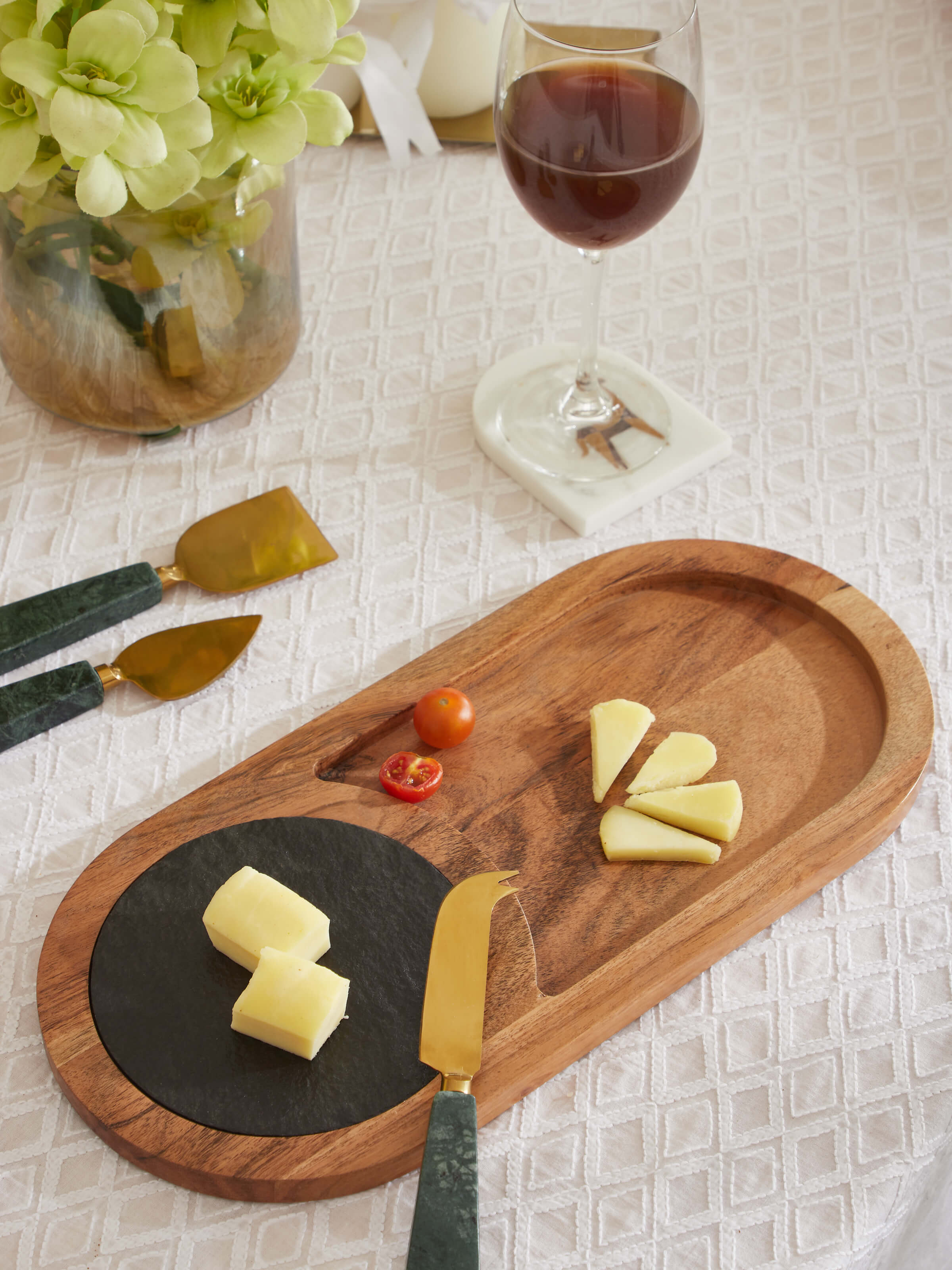 Side view of Acacia wood & slate stone cheese board showcasing its elegant profile and materials