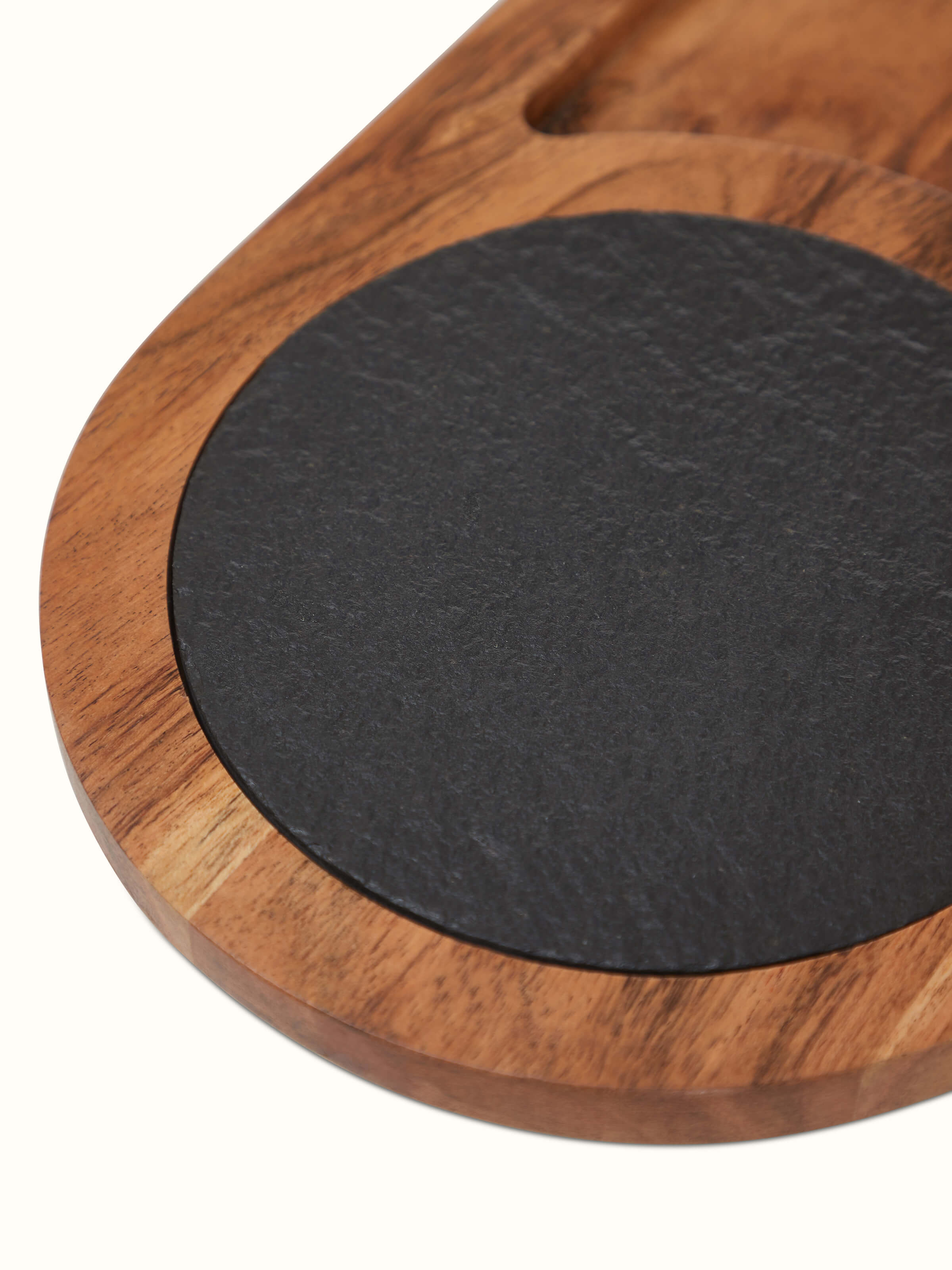 Detailed view of Acacia wood & slate stone cheese board focusing on the craftsmanship and finishes