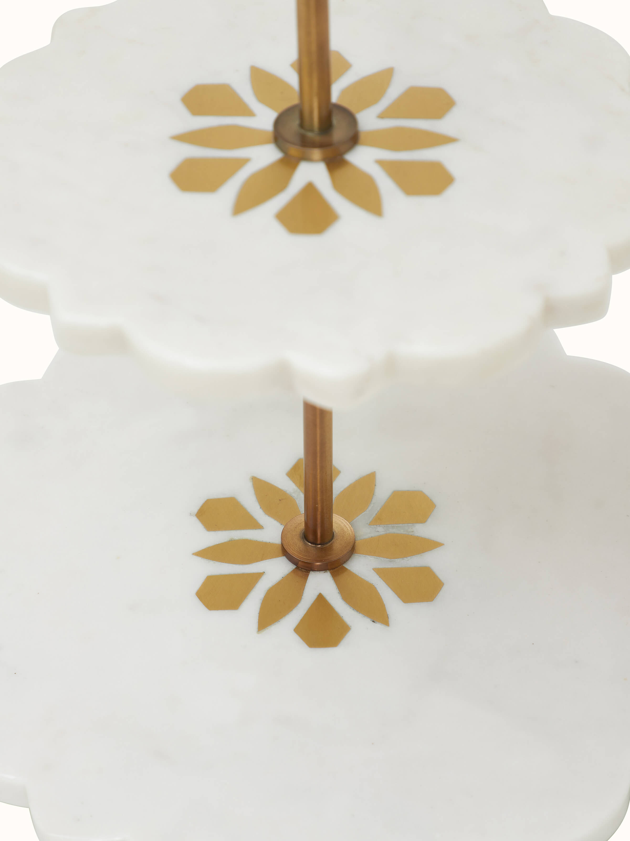 Detailed view of Marble & Brass 2-tier cake stand highlighting the intricate design of the marble and brass elements