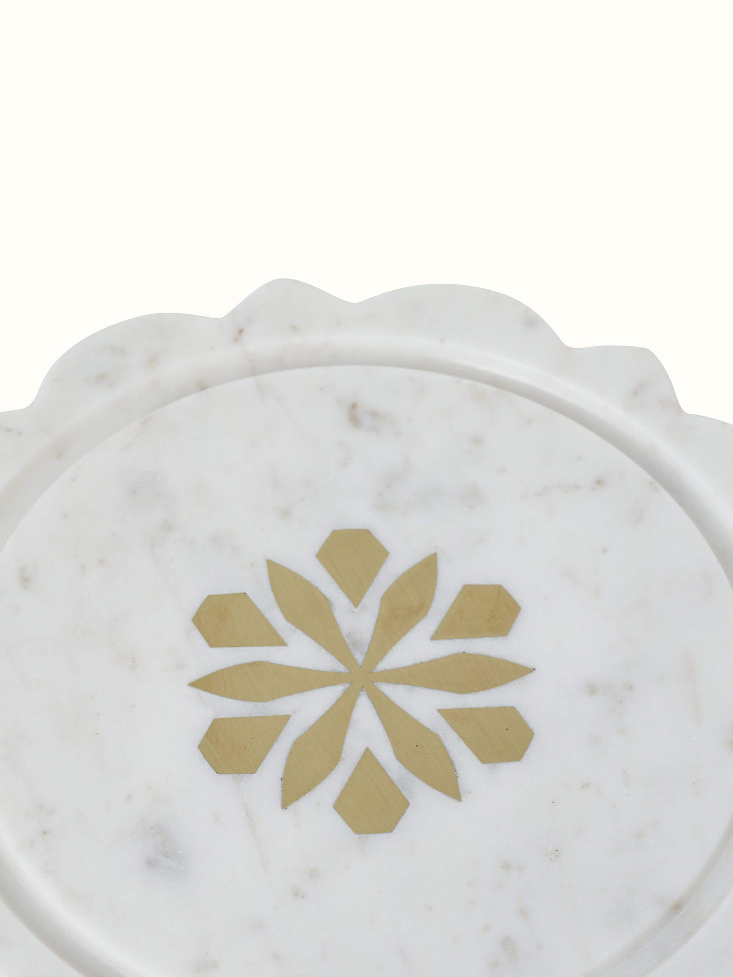 Side view of carved marble and glass cloche displaying its smooth finish