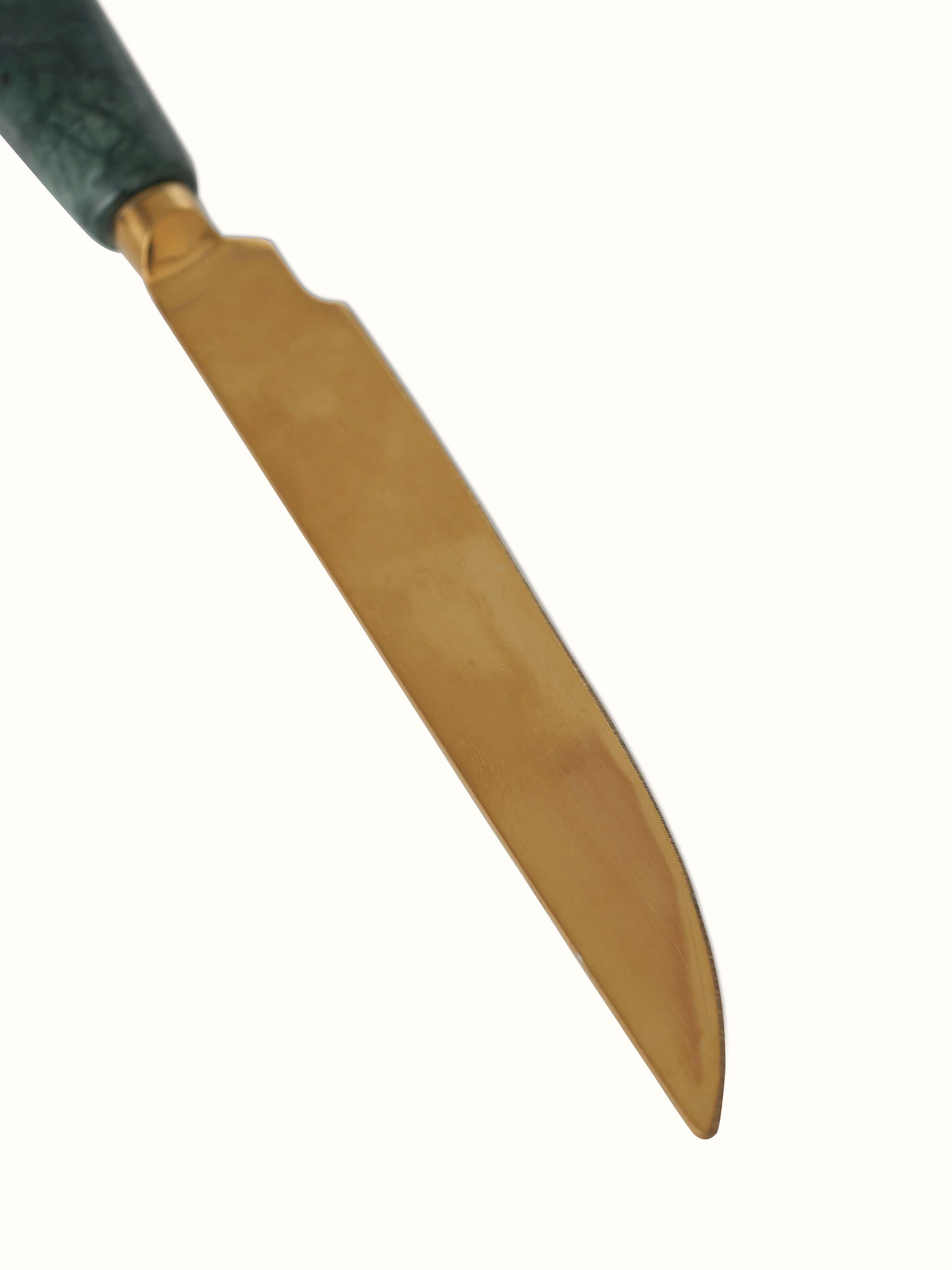 Detailed view of Marble & Brass Inlaid Butter Knife emphasizing intricate design.