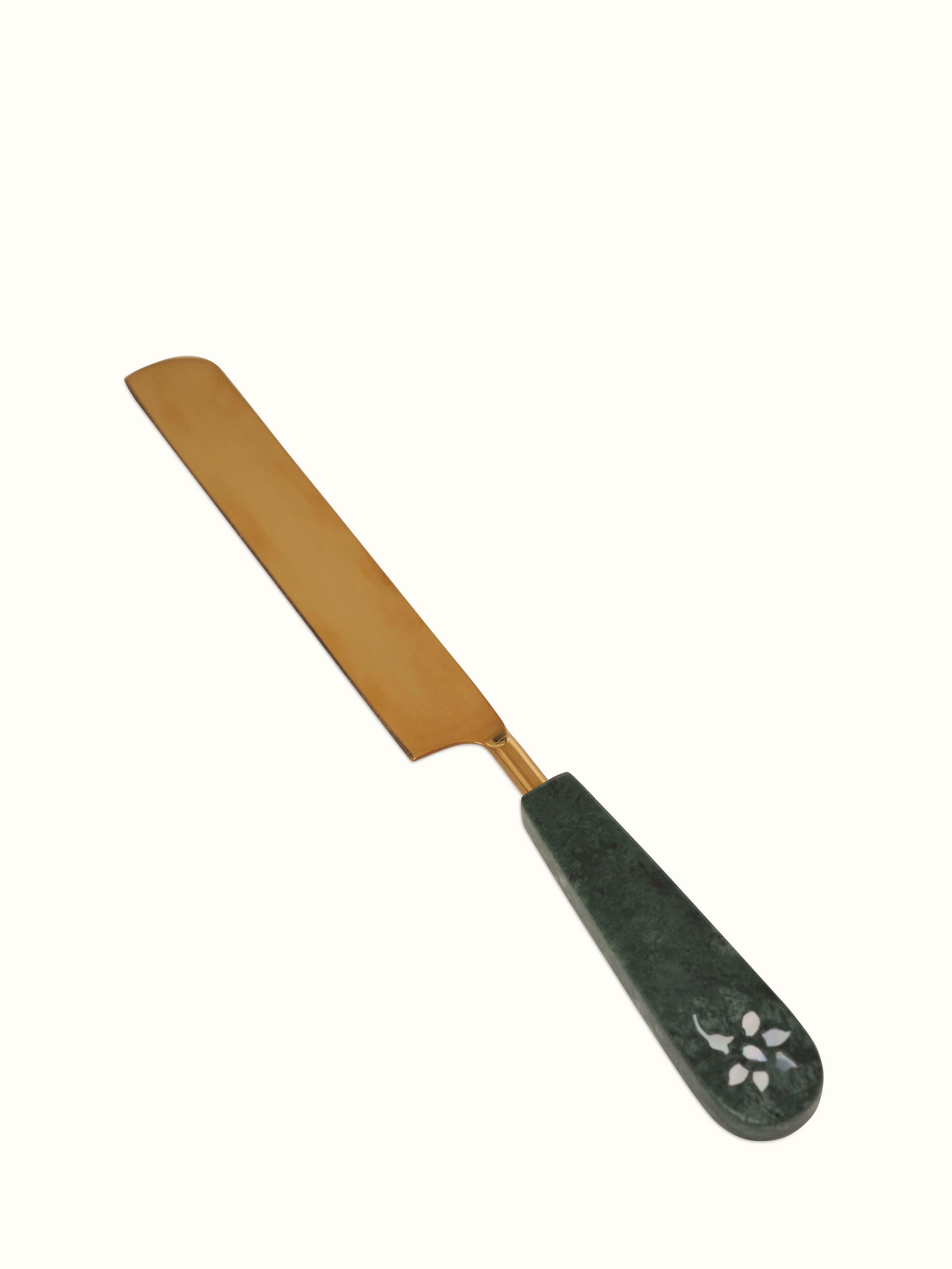 Angled view of marble & brass cake servers set of 2, highlighting their stylish design