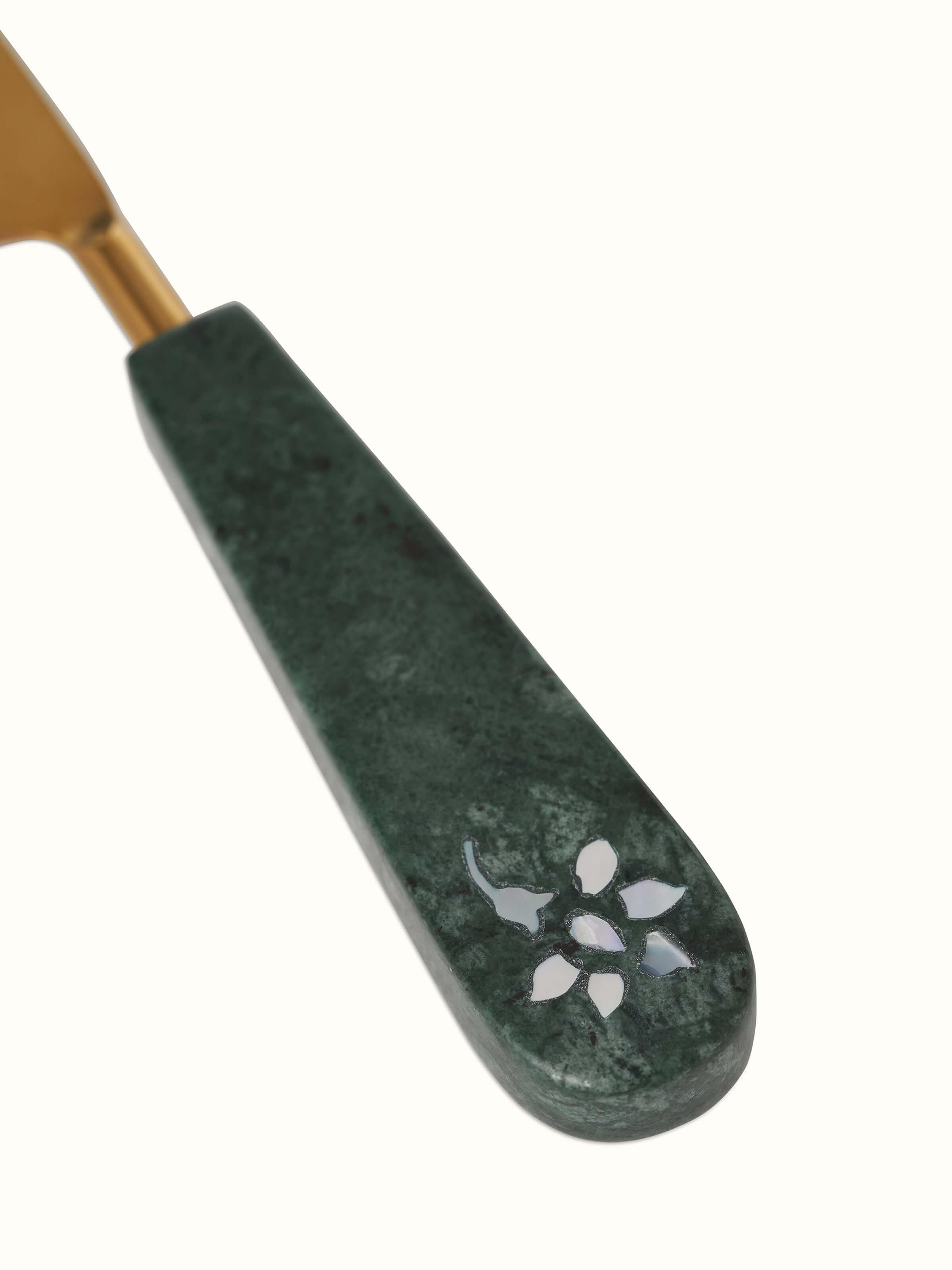 Detailed view of marble & brass cake servers set of 2, focusing on intricate design elements