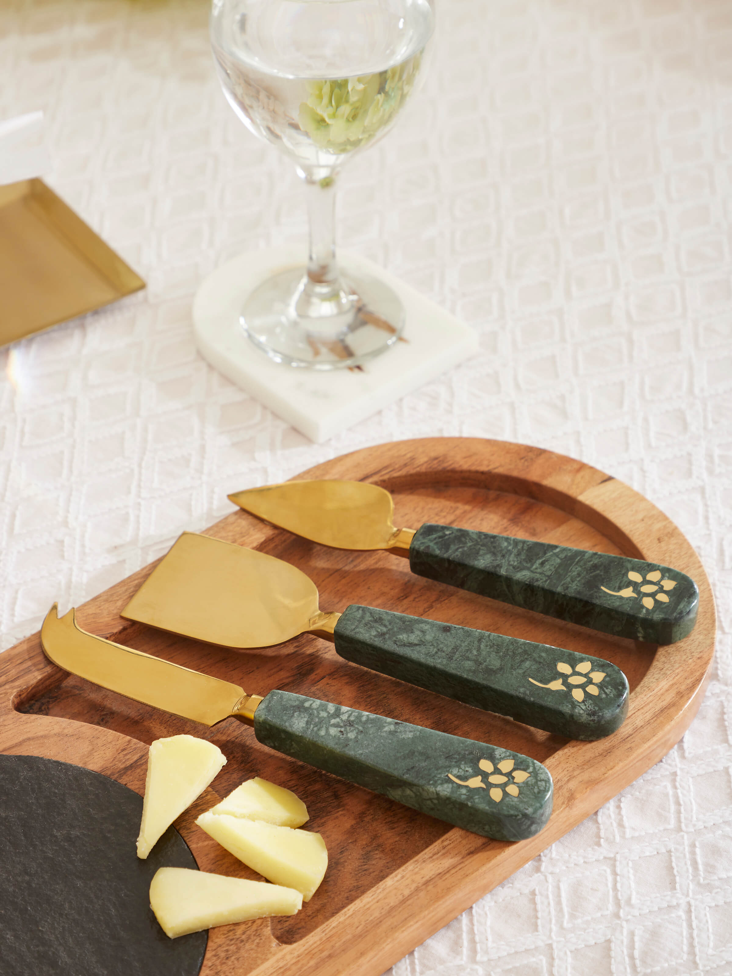 Side view of Marble & Brass Cheese Knives (3 pcs) highlighting blade and handle design