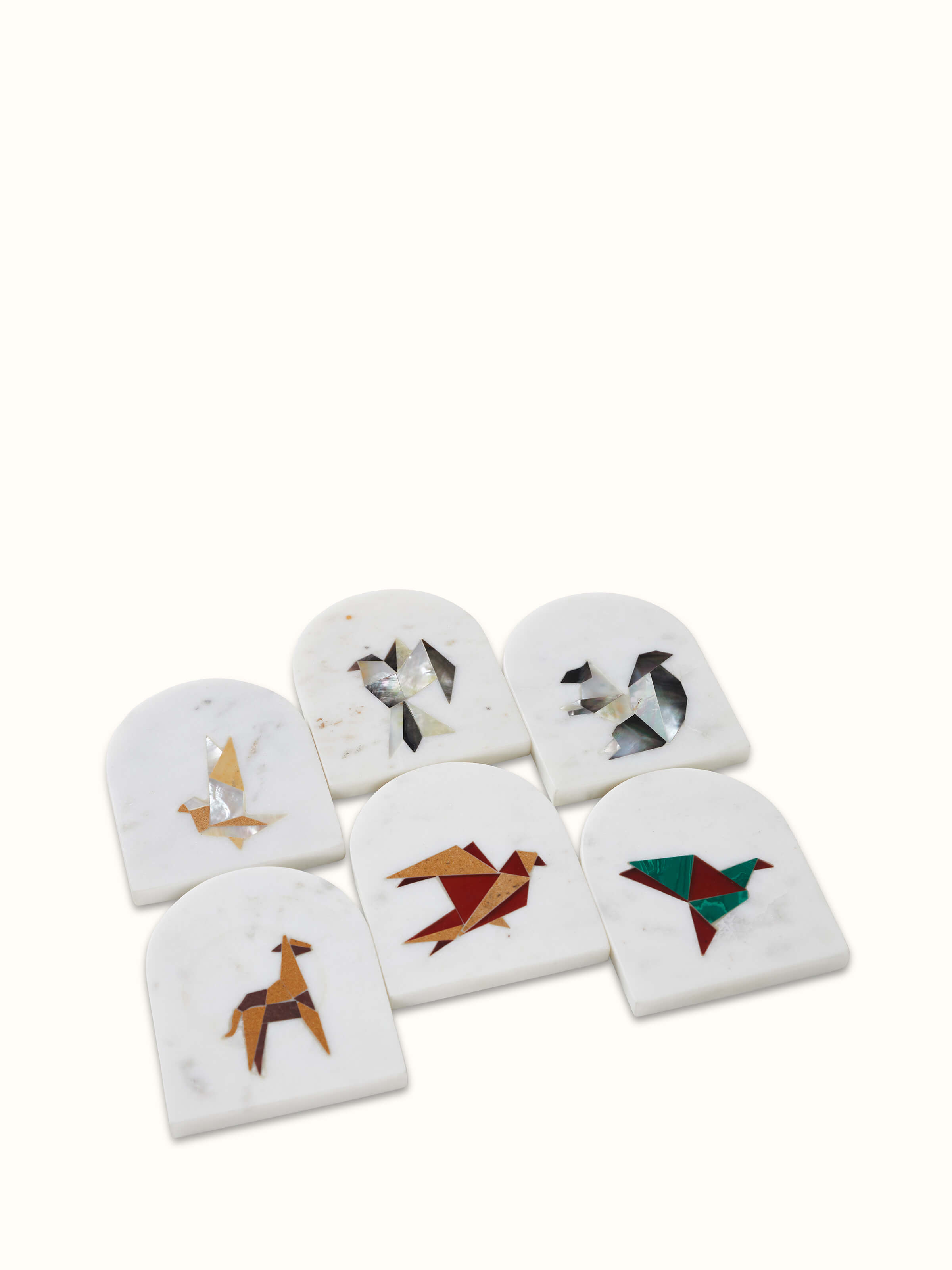 Front view of Carved Marble Coasters (6 pcs) displaying the detailed carving on the coasters and their marble texture.