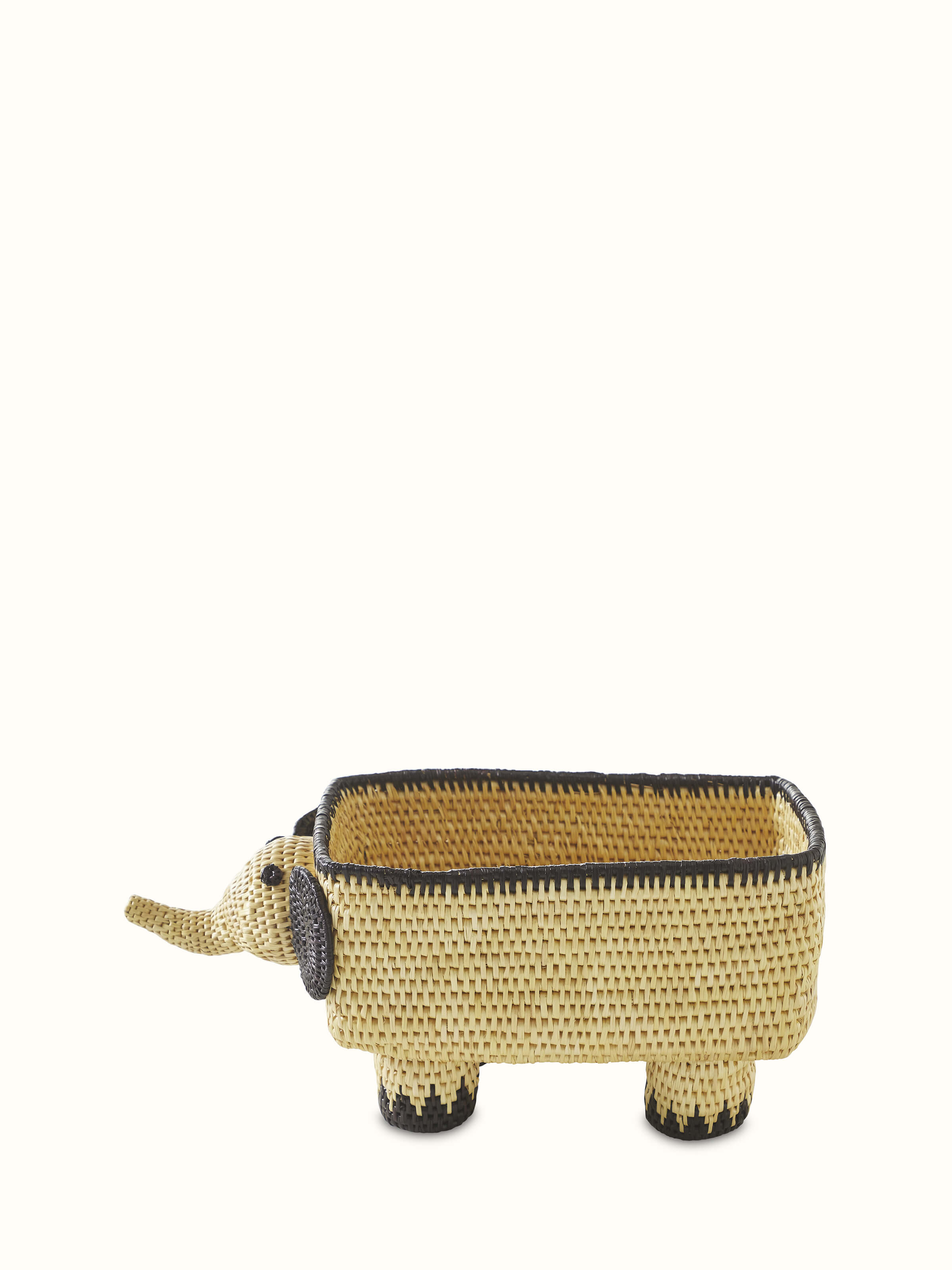 Angle view of Sikki Grass Fruit Bowl in white showcasing the intricate weave and craftsmanship.