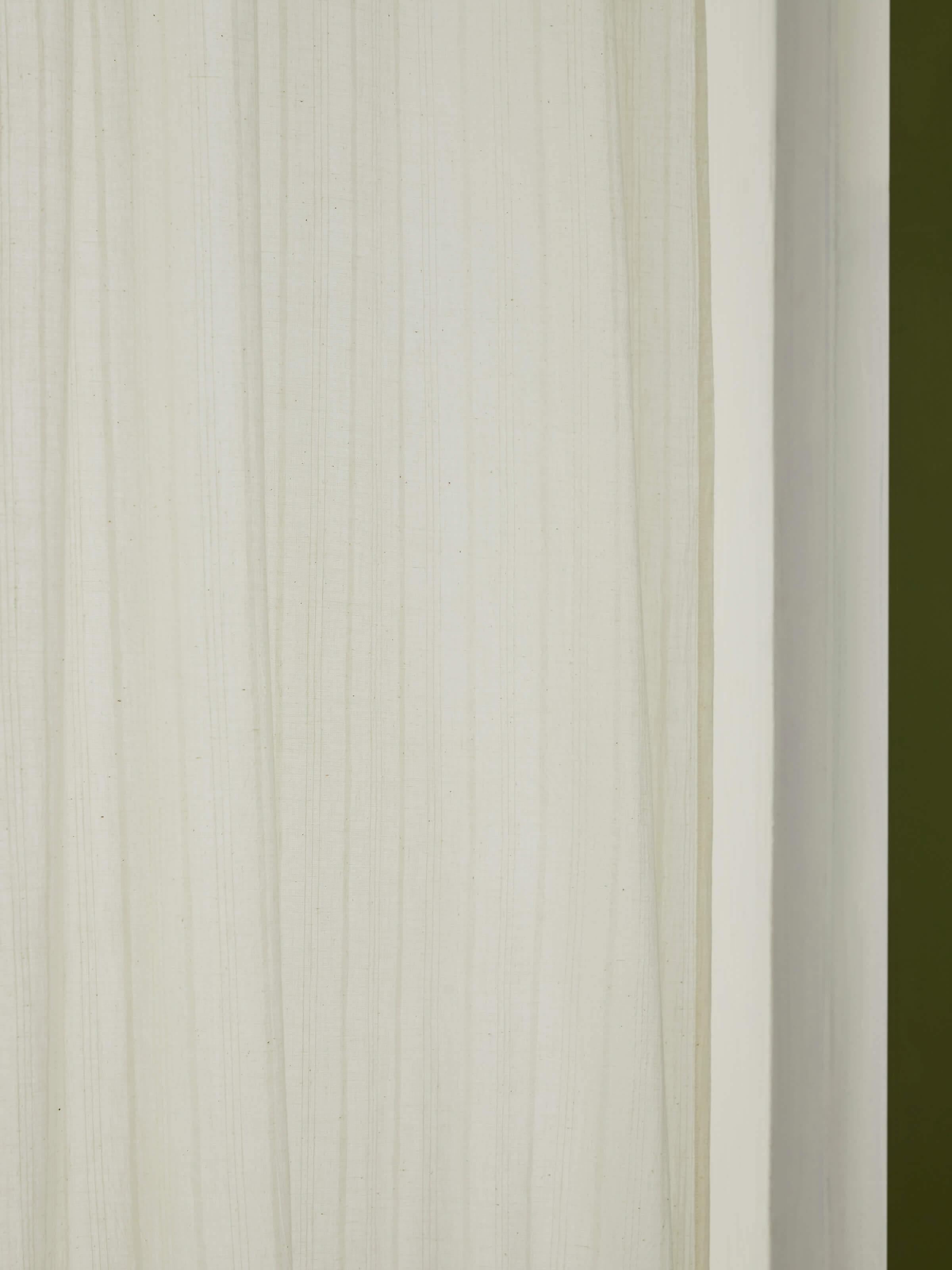 Full length view of Kapasa Off-White Solid Handloom Cotton Curtain (7 ft) in a room setting