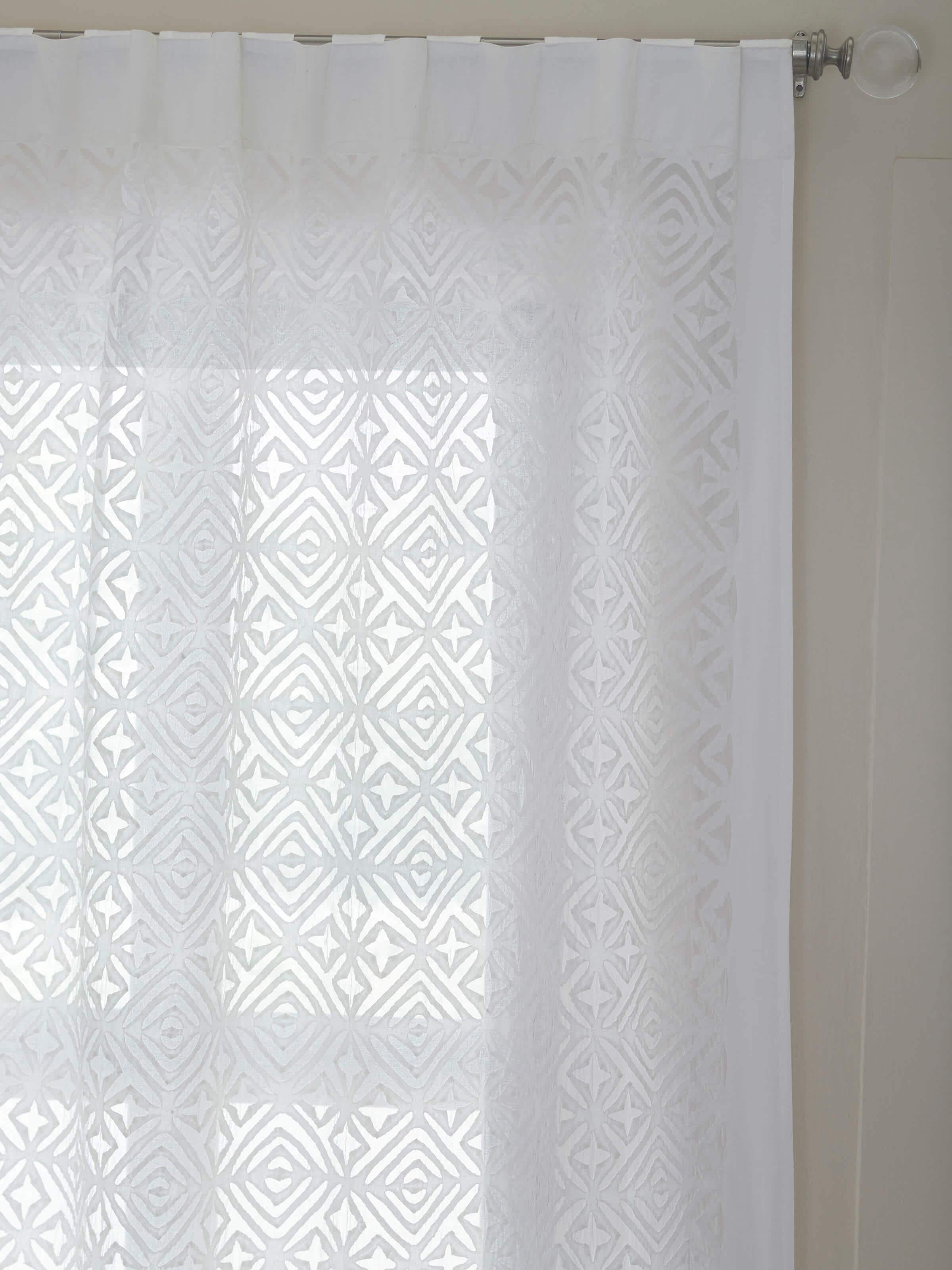 Detailed view of Mandana White Trellis cotton sheer curtain featuring the delicate trellis pattern