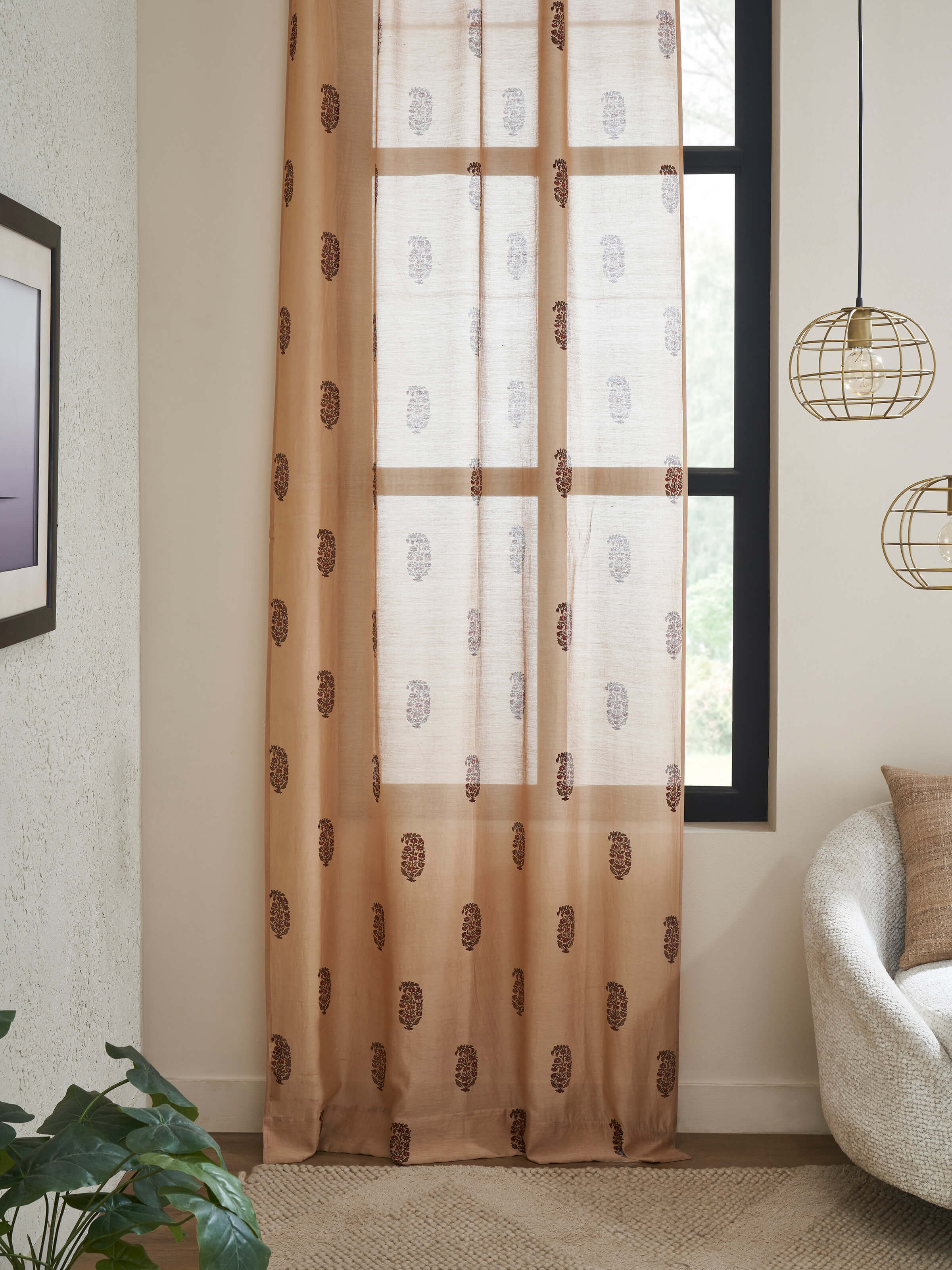 Close-up view of Vasudha rust buta silk cotton Bagru hand block print sheer curtain emphasizing the intricate Bagru block print and fabric texture.