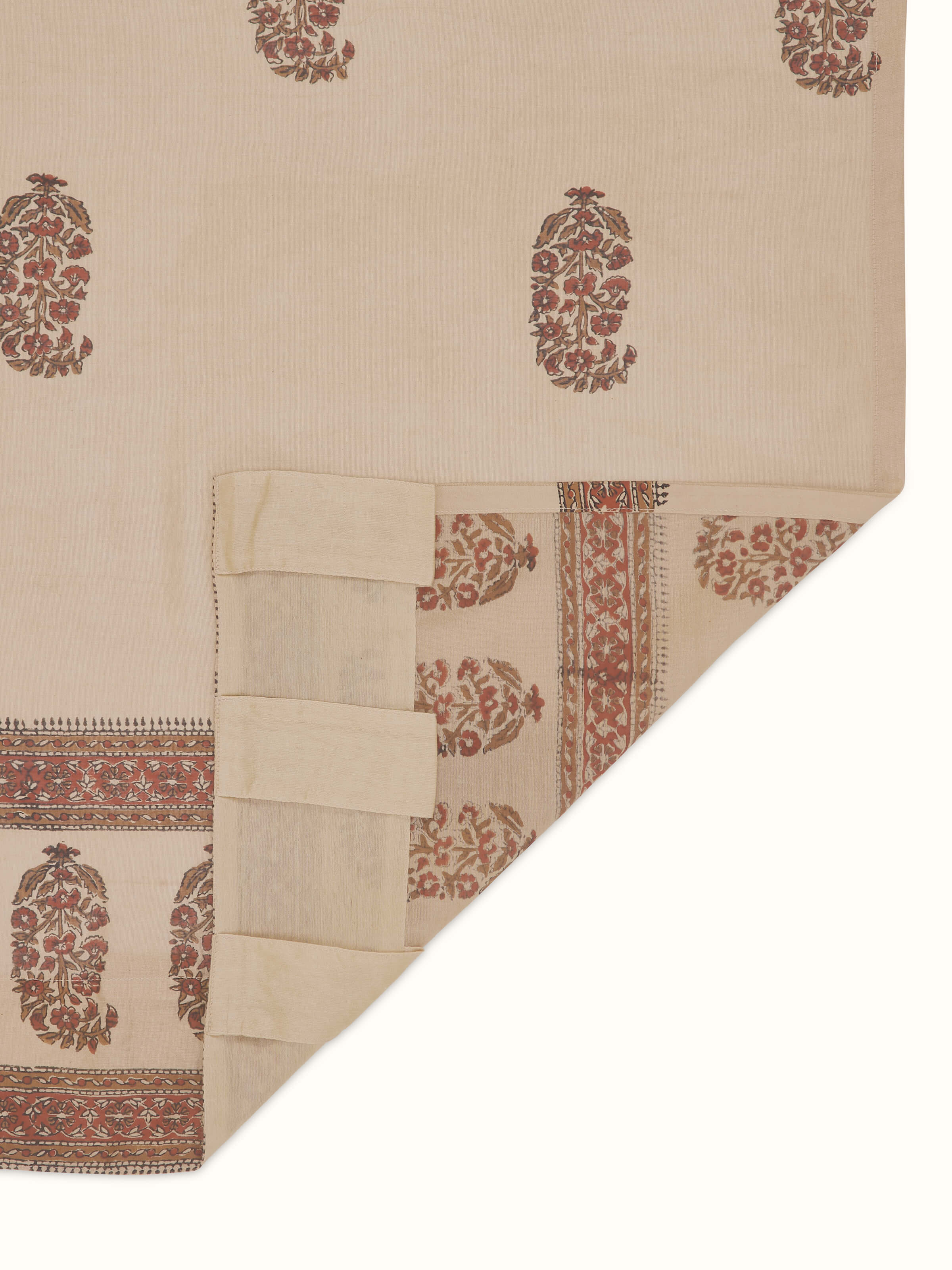 Close-up view of Vasudha rust buta silk cotton Bagru hand block print sheer curtain highlighting the fabric texture and print detail.