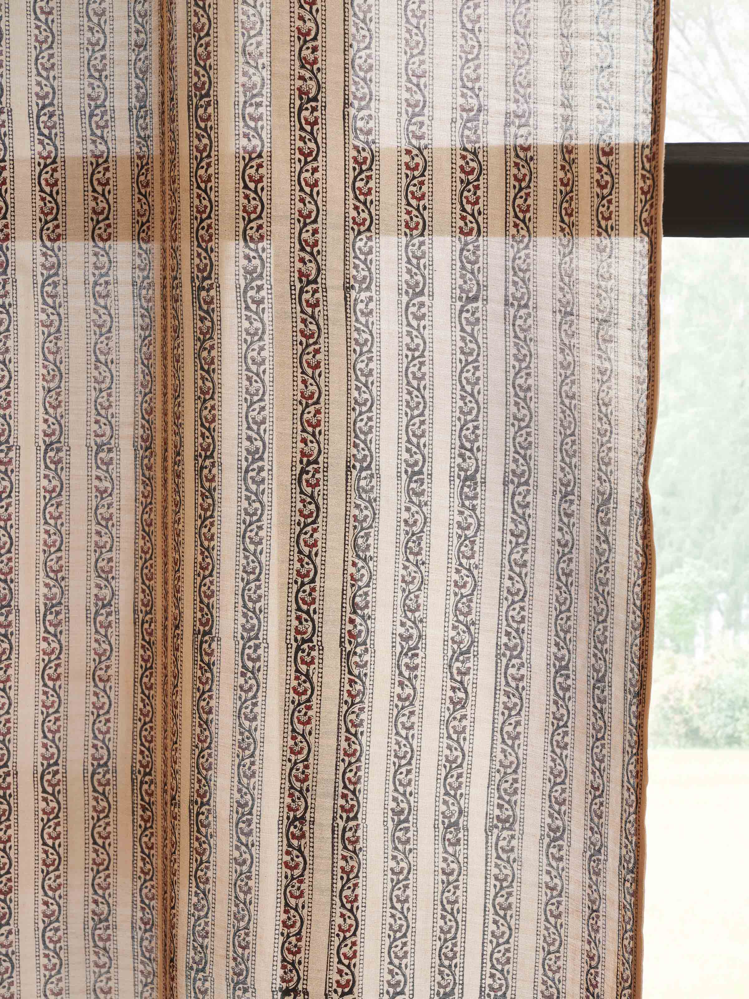 Close-up of Vasudha rust stripe buta silk cotton Bagru hand block print sheer curtain (9 ft), highlighting the intricate block print details and fabric texture.
