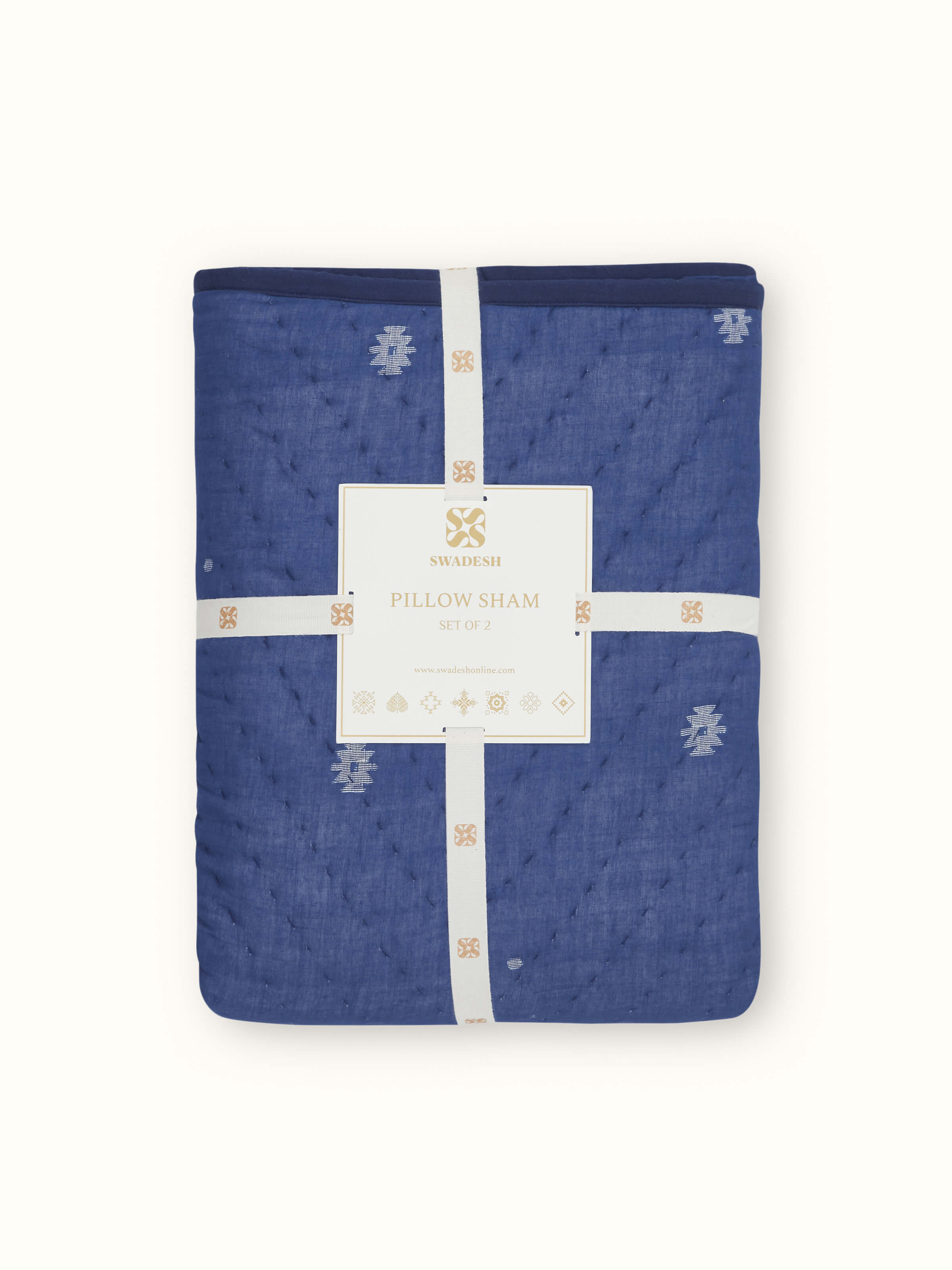 Close-up of Kalpanama indigo woven buti cotton pillow shams with detailed buti design and rich indigo tones.