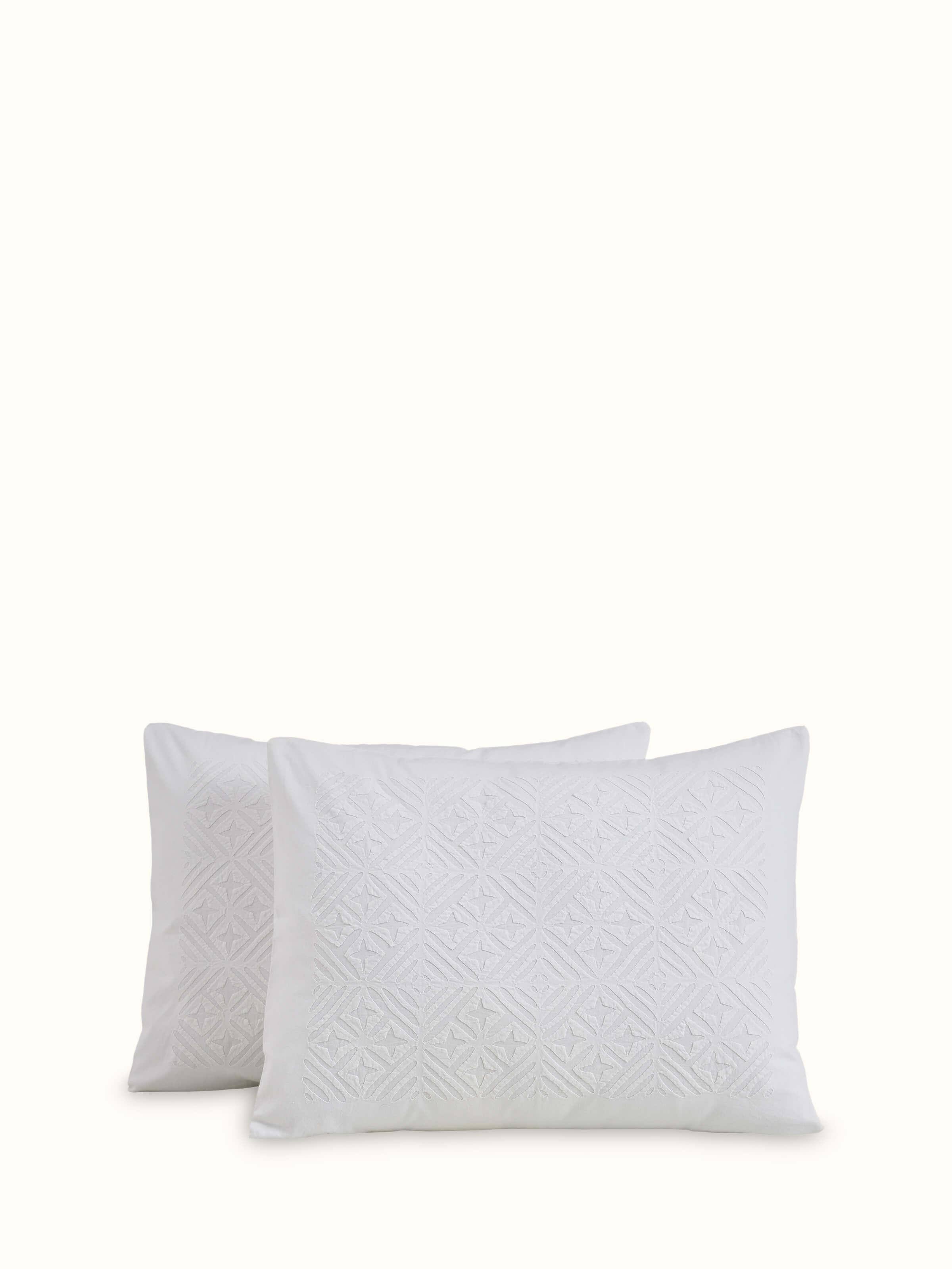 Top view of Jharokha White Trellis Cotton Appliqué King Bedspread Set showcasing its detailed appliqué work.