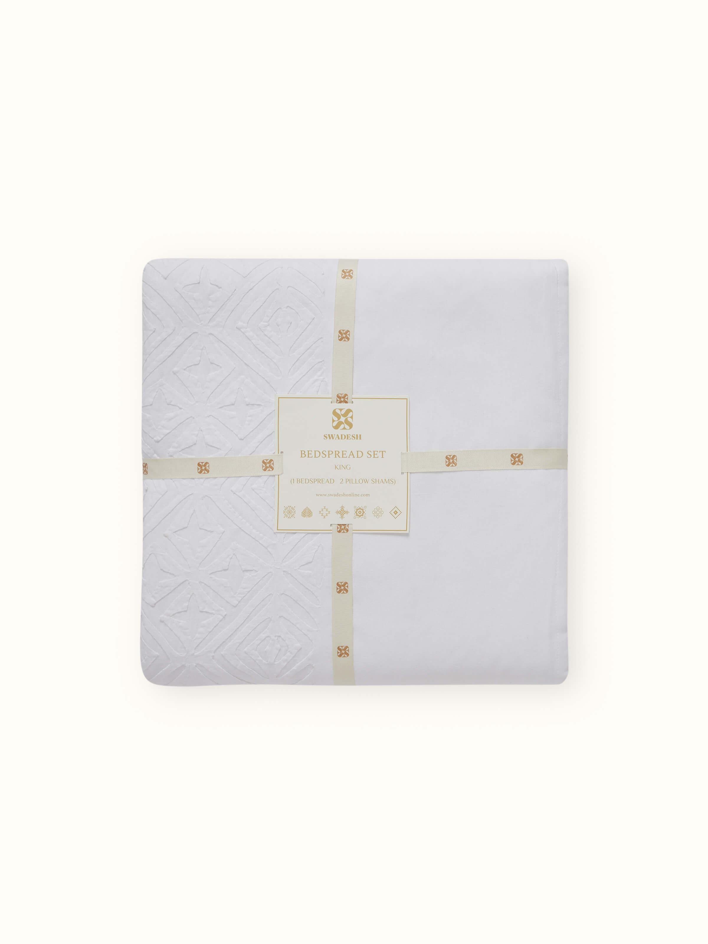 Close-up of Jharokha White Trellis Cotton Appliqué King Bedspread Set highlighting the fabric and appliqué design details.