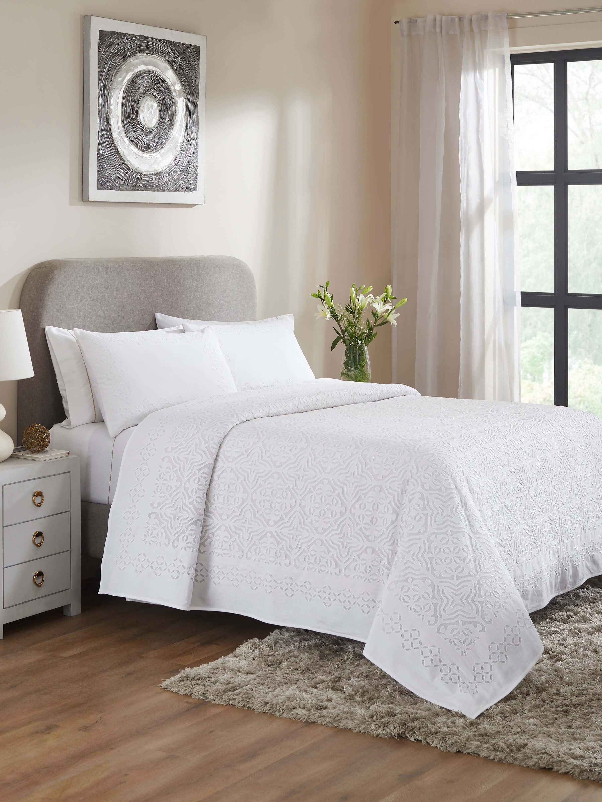 Side view of Mandala White Medallion Cotton Appliqué King Bedspread Set (3 pcs) highlighting the texture and detailed appliqué work.