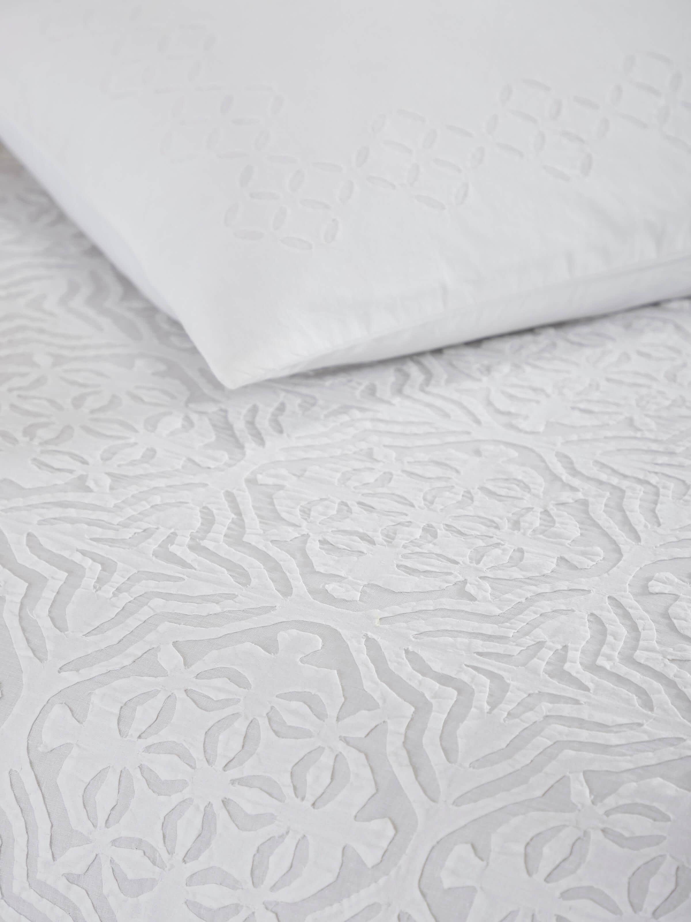 Detailed shot of Mandala White Medallion Cotton Appliqué King Bedspread Set (3 pcs) showcasing the white medallion design and high-quality cotton.