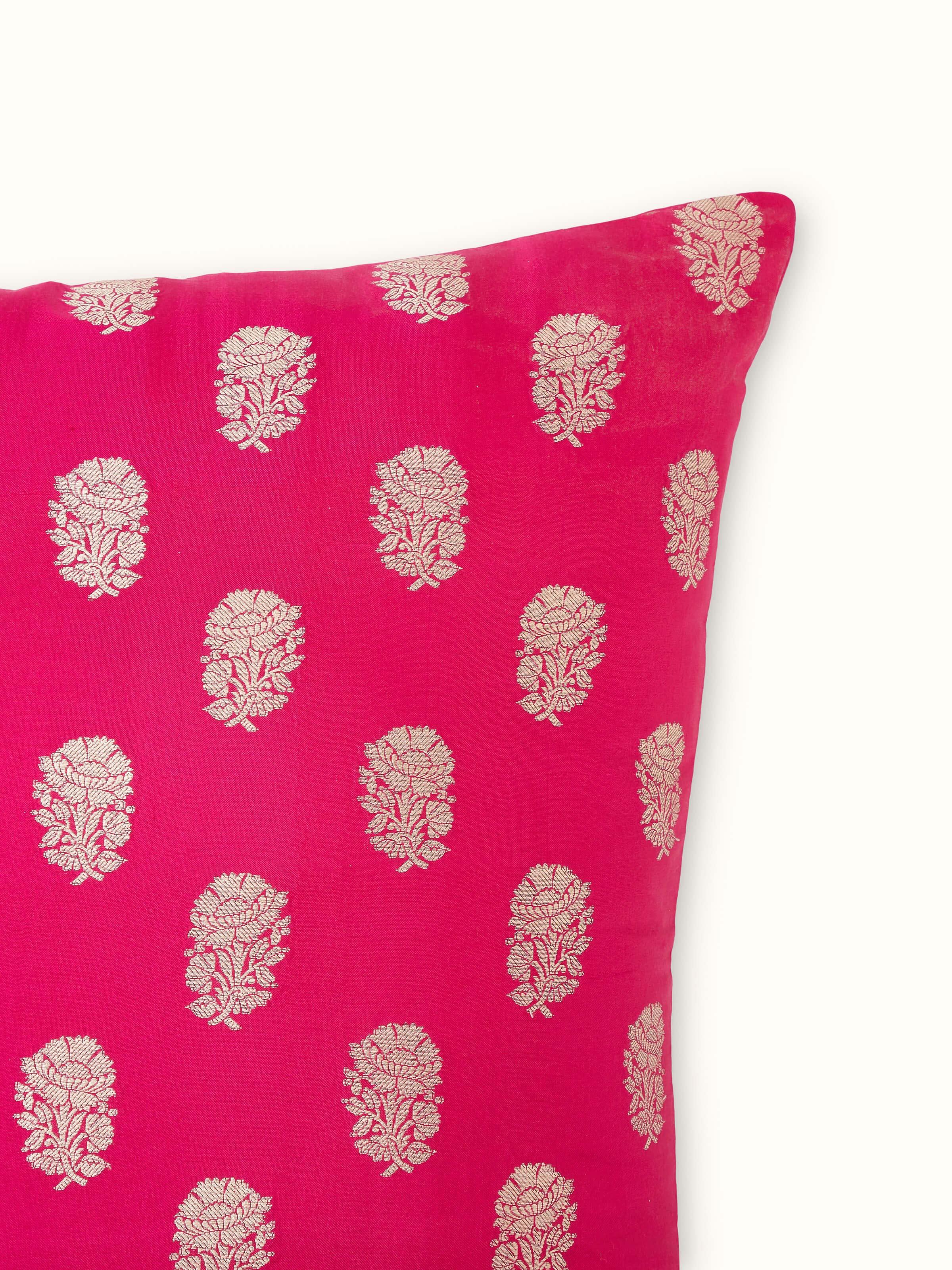 Side view of Avasa raspberry buti silk brocade Banarasi handloom cushion cover showing the cushion's thickness and brocade work
