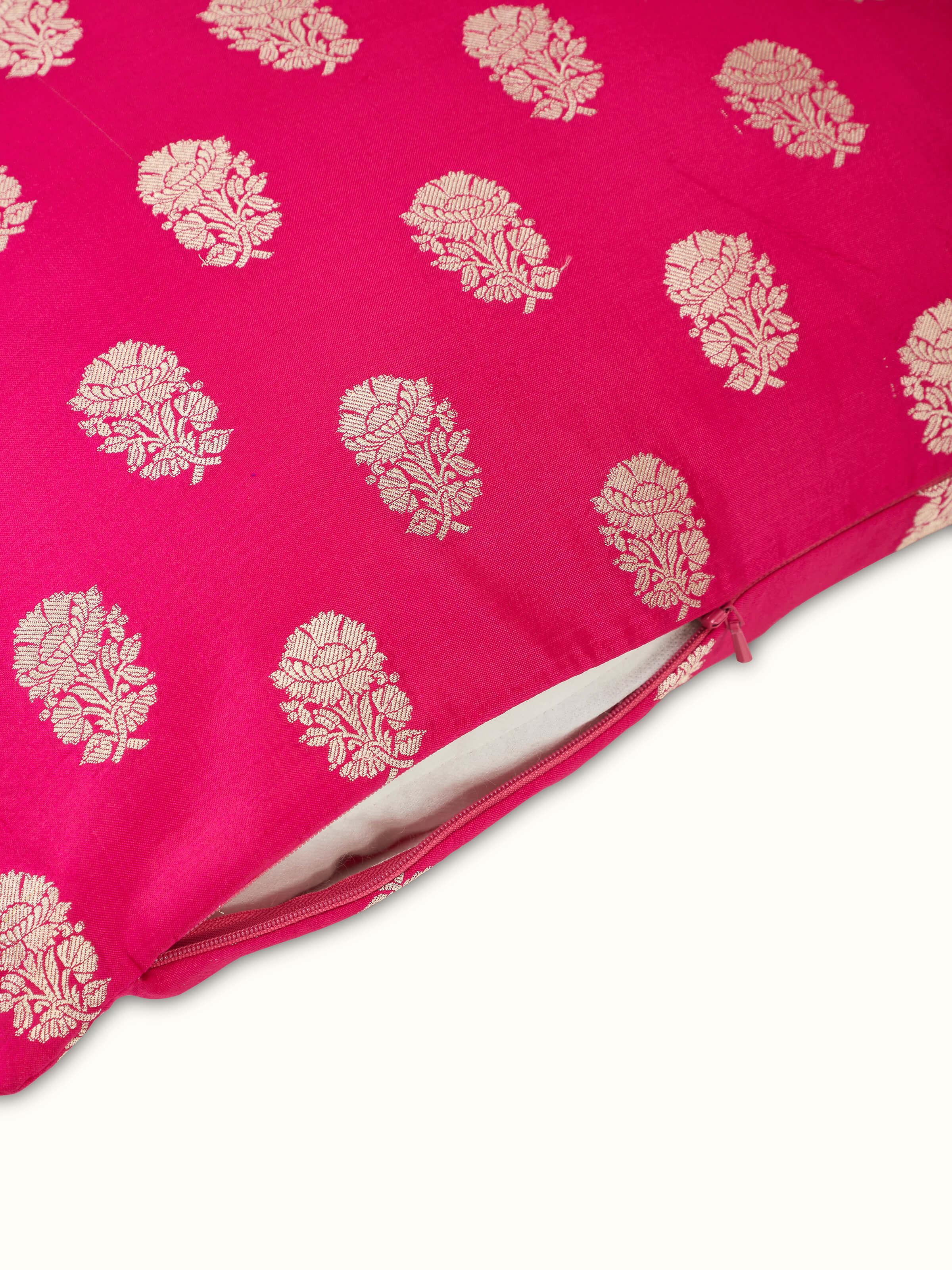 Close-up of Avasa raspberry buti silk brocade Banarasi handloom cushion cover focusing on the texture and embroidery details of the brocade pattern