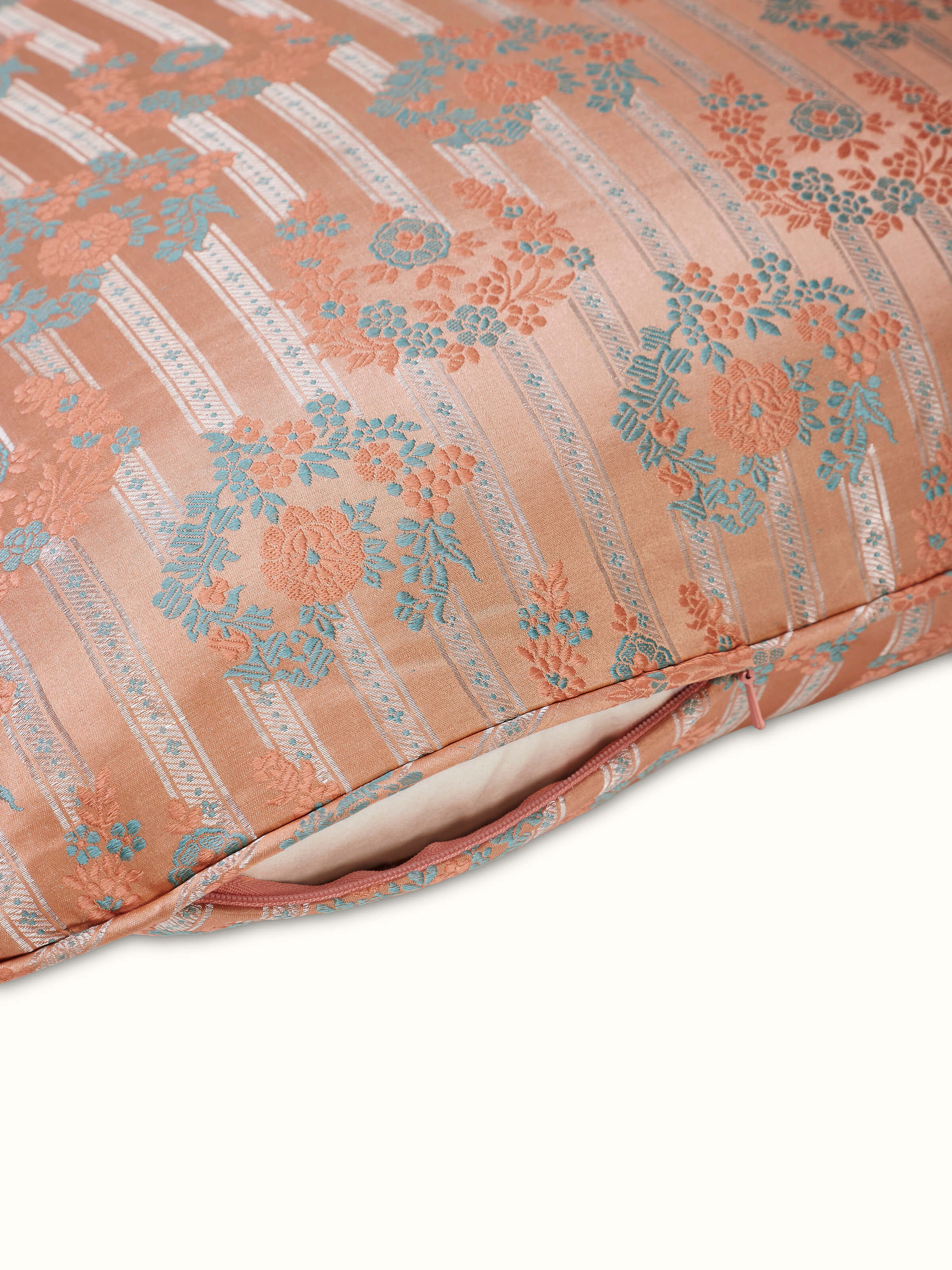 Fine detail highlighting ornate Banarasi floral patterns and handwoven silk texture